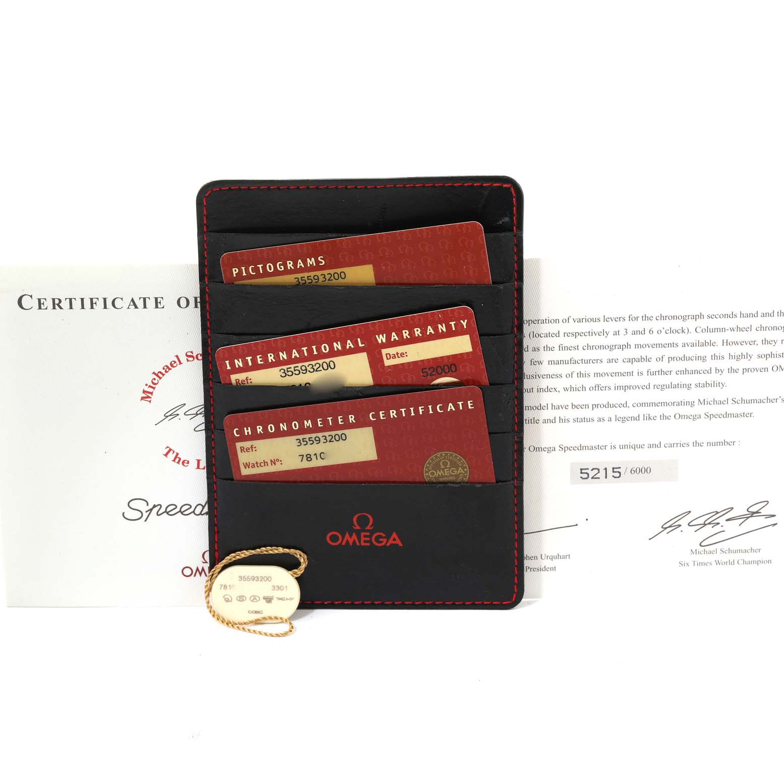 The image shows the warranty cards, certifications, and documentation for the Omega Speedmaster 3559.32.00 Men
s Stainless Steel Silver Dial 3559.32.00 Men
s Stainless Steel Silver Dial.