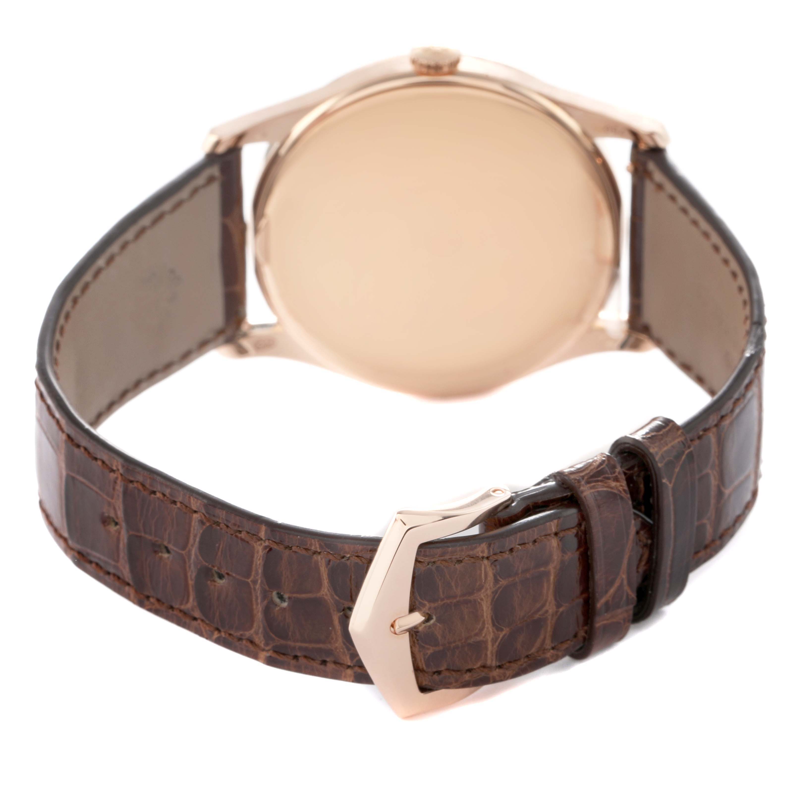 The image shows the back view of a Patek Philippe Calatrava 5196R-001 Men's Rose Gold Silver Dial, highlighting the case, buckle, and leather strap.