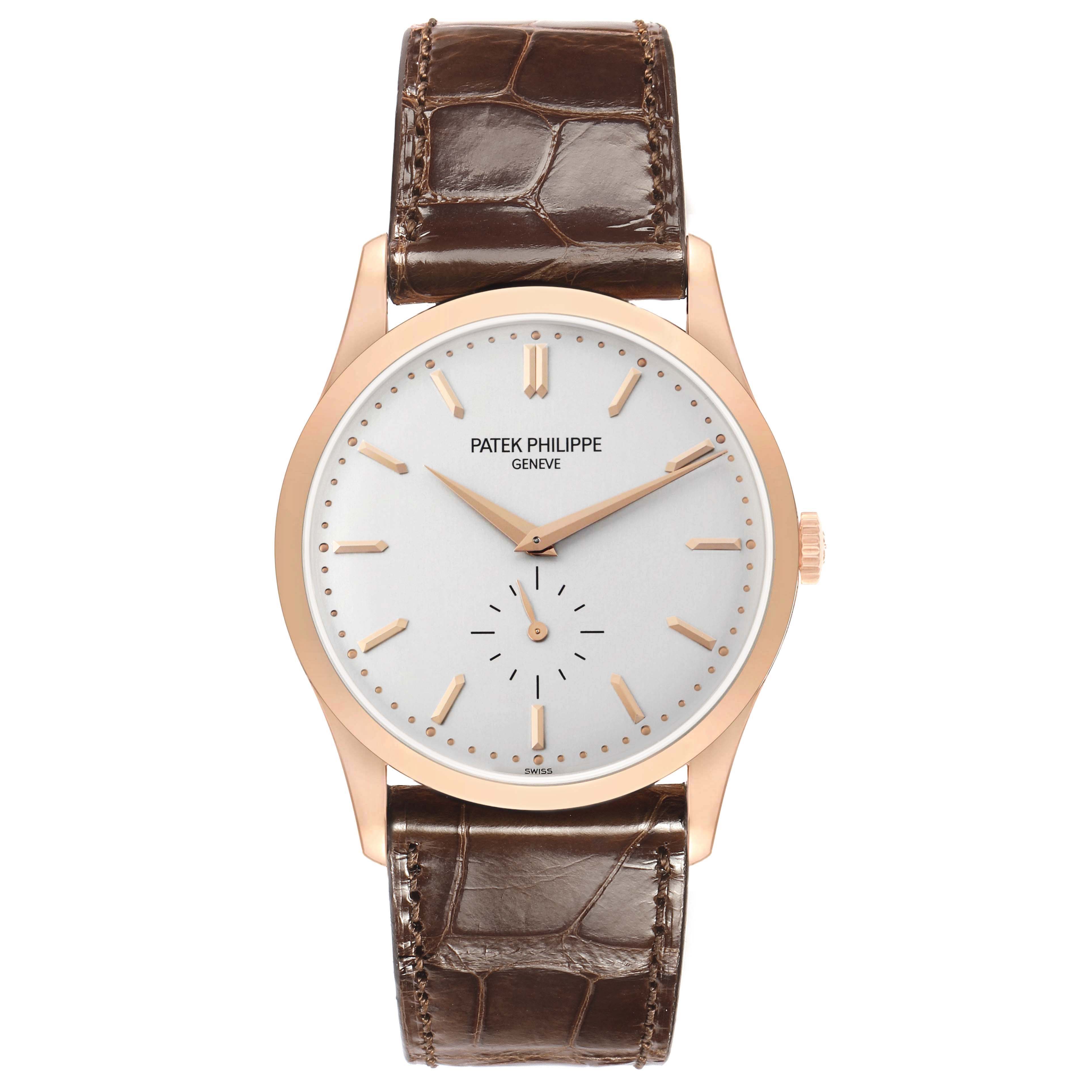 The Patek Philippe Calatrava 5196R-001 Men's Rose Gold Silver Dial watch is shown from a top view, highlighting the dial, case, hands, and leather strap.
