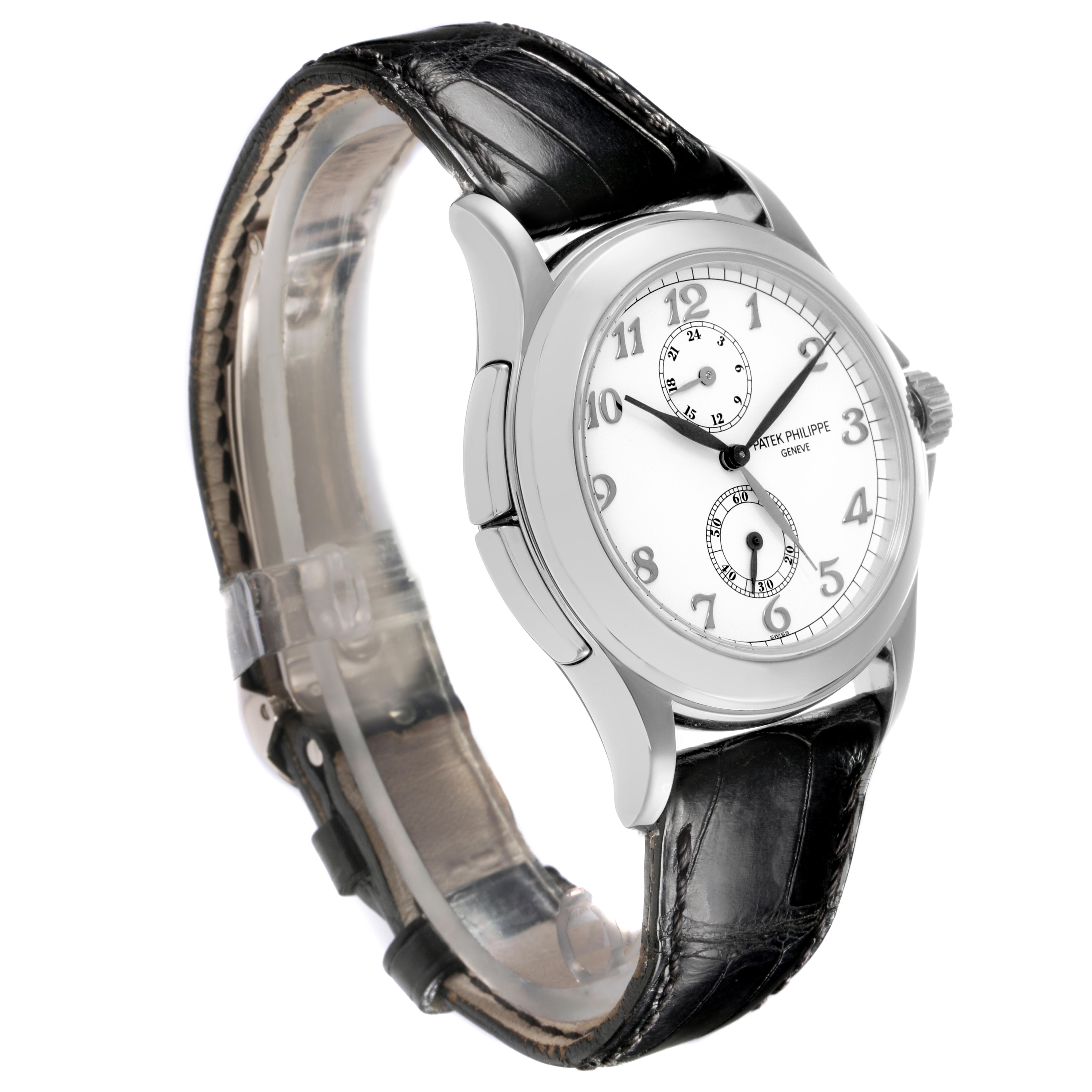 The Patek Philippe Calatrava 5134G Men
s White Gold White Dial 5134G Men
s White Gold White Dial watch is shown at a three-quarter angle, highlighting the face, case, strap, and crown.