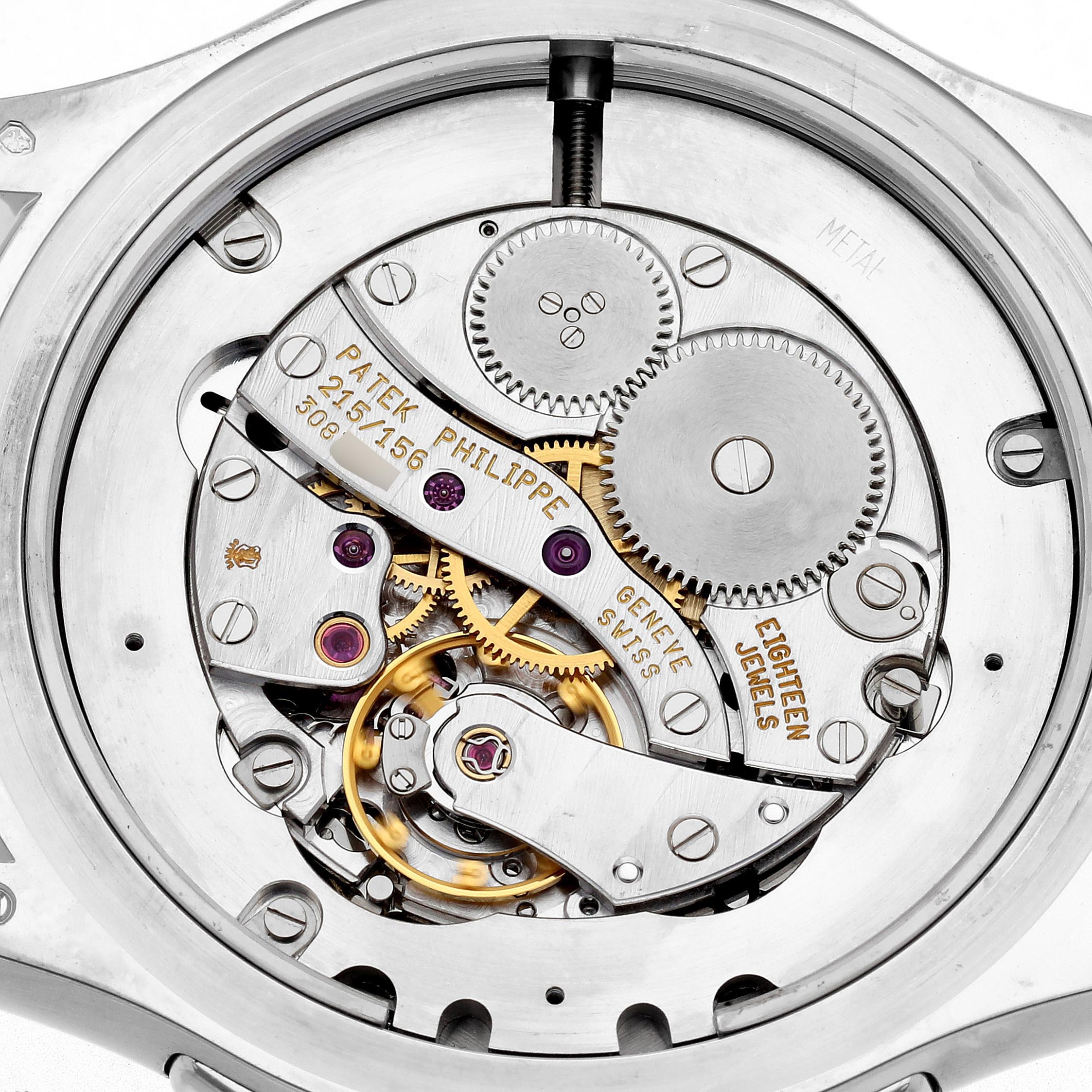 The image shows the intricate back view of a Patek Philippe Calatrava 5134G Men
s White Gold White Dial 5134G Men
s White Gold White Dial watch, highlighting its internal mechanics and gears.