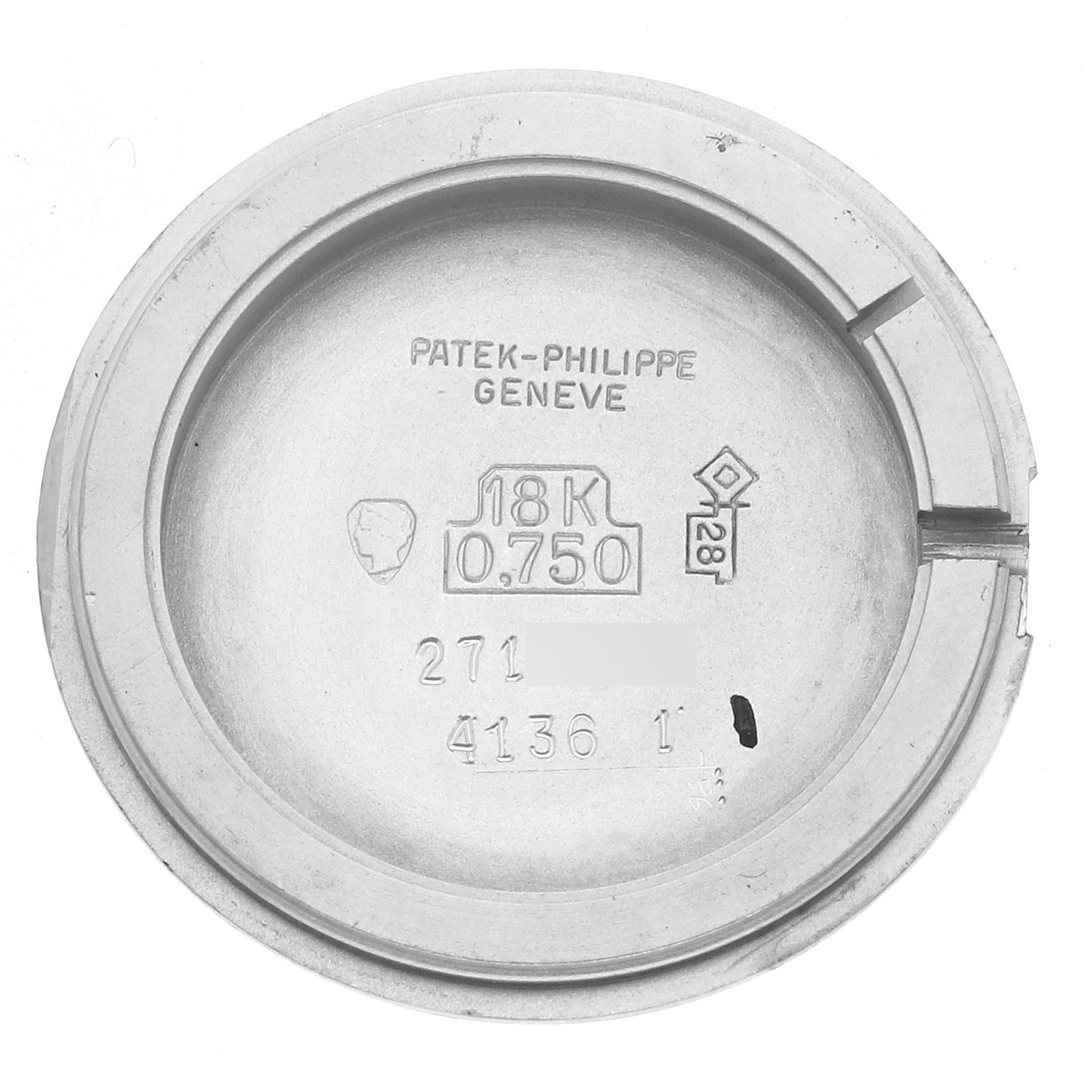 The image shows the back case interior of a Patek Philippe Calatrava 4136/001 Women
s White Gold Blue Dial 4136/001 Women
s White Gold Blue Dial watch, displaying hallmarks and inscriptions.