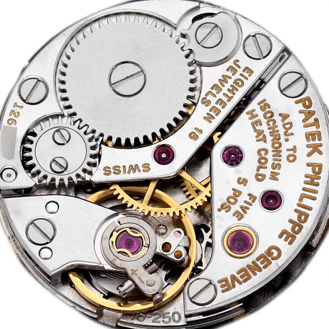 The image shows the intricate movement mechanism of the Patek Philippe Calatrava 4136/001 Women
s White Gold Blue Dial 4136/001 Women
s White Gold Blue Dial watch viewed from above, highlighting gears and engravings.