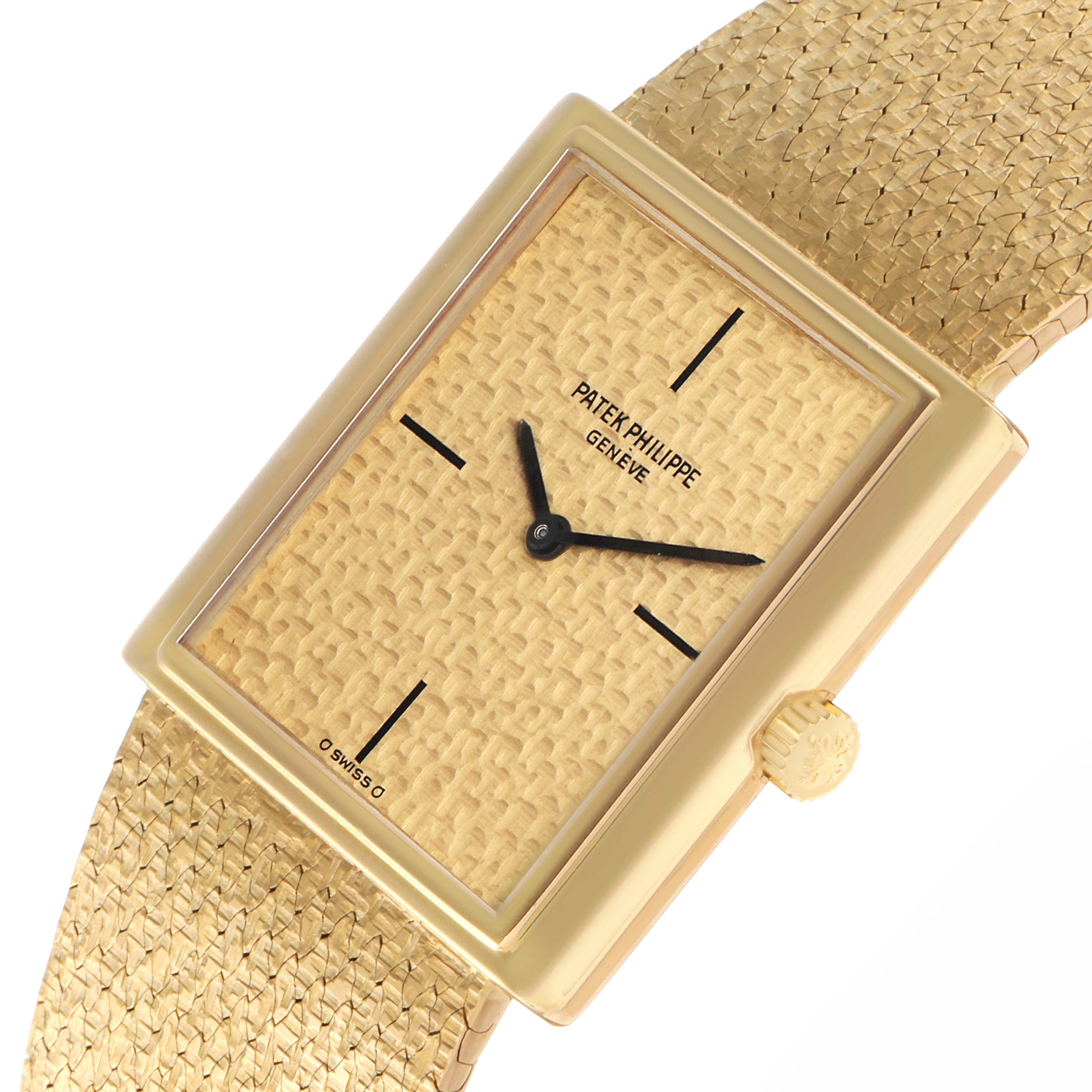 The vintage Patek Philippe watch is shown at a slight angle, highlighting the face, textured dial, and crown.