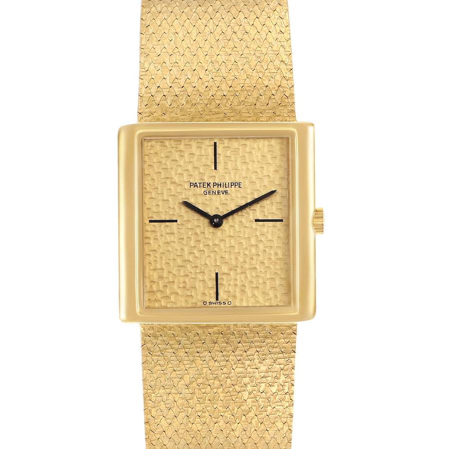 The image shows a frontal view of a Vintage Patek Philippe watch, highlighting its square dial, textured face, and integrated bracelet.