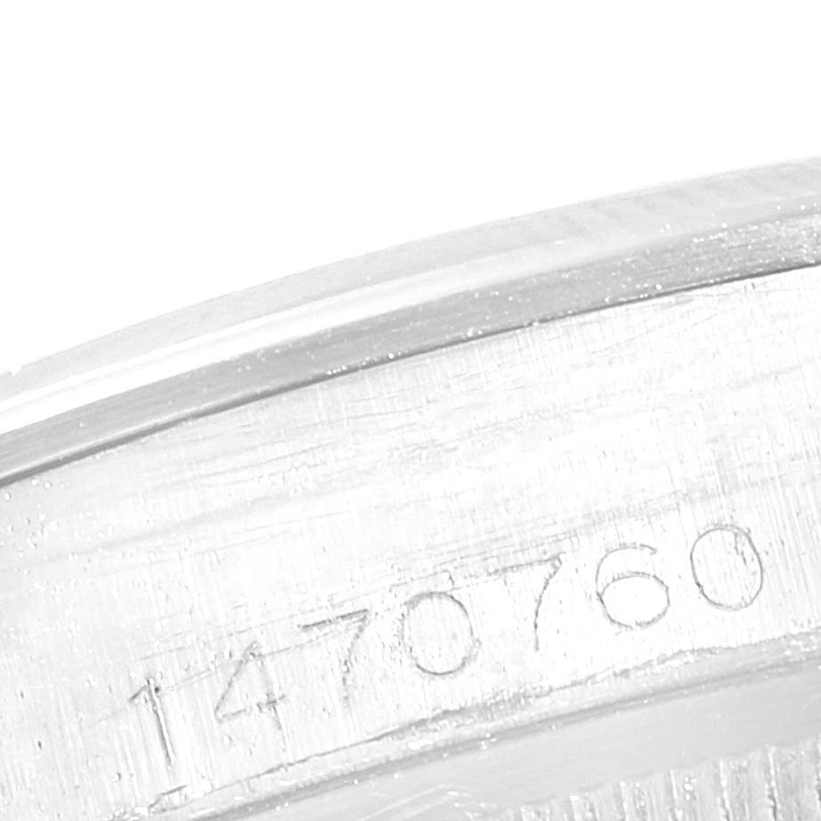 The image shows a close-up view of the inside case serial number of a Rolex Air-King 5700 Men's Stainless Steel Silver Dial 5700 Men's Stainless Steel Silver Dial watch.
