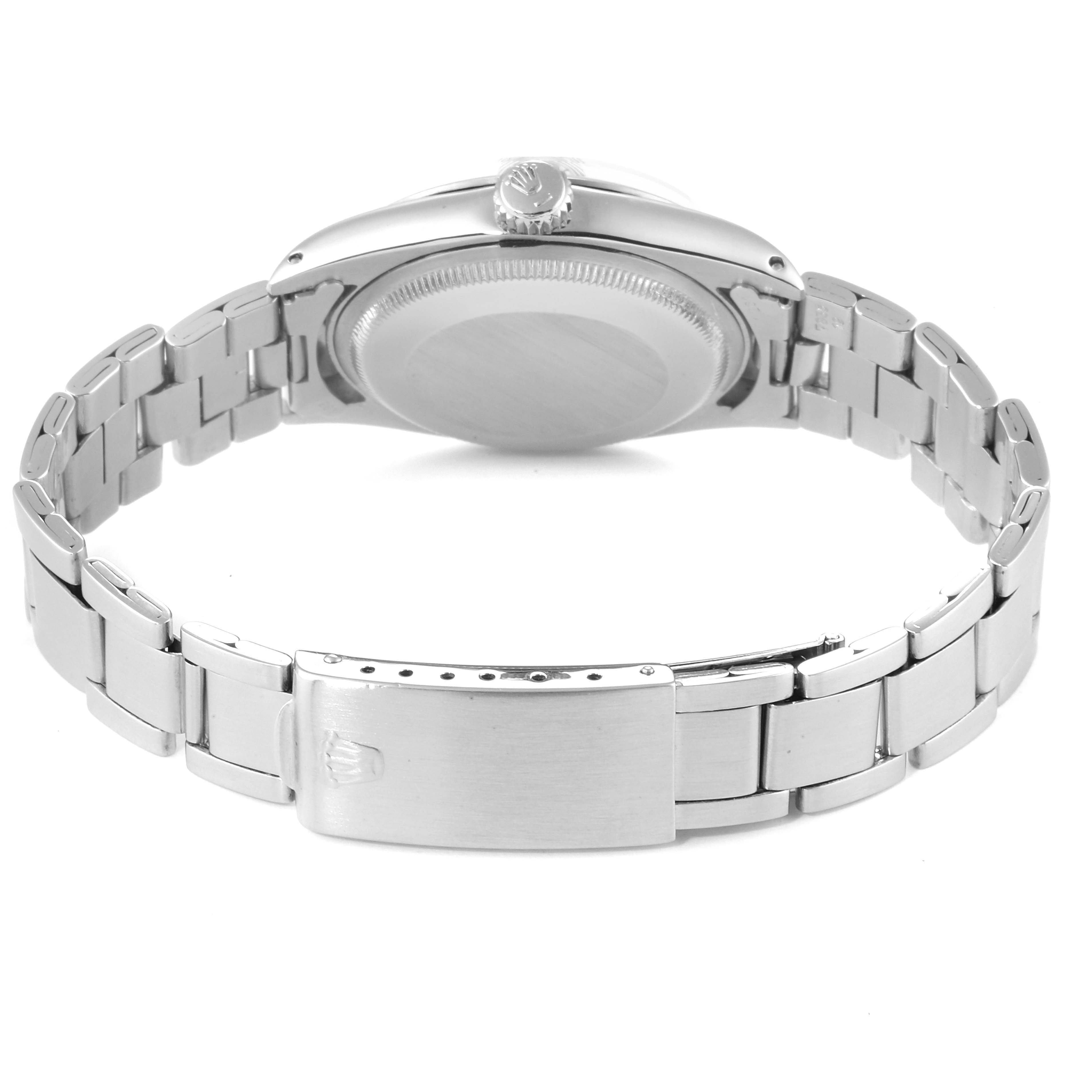 The image shows the backside of a Rolex Air-King 5700 Men's Stainless Steel Silver Dial 5700 Men's Stainless Steel Silver Dial watch, highlighting the case back and bracelet clasp.