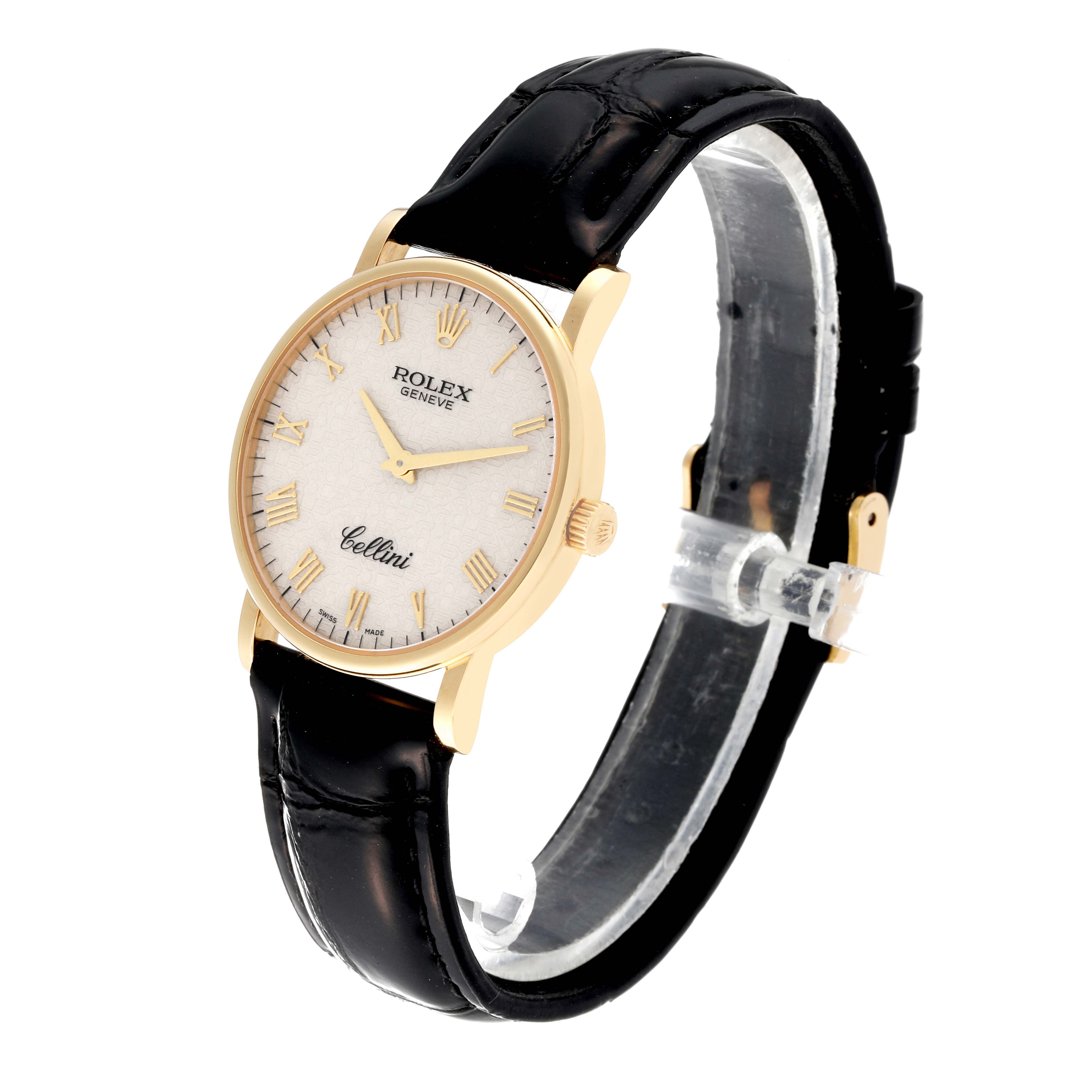 The Rolex Cellini 5115/8 Men's Yellow Gold White Dial 5115/8 Men's Yellow Gold White Dial watch is shown at a three-quarter angle, highlighting its gold case, white dial, black leather strap, and Roman numerals.