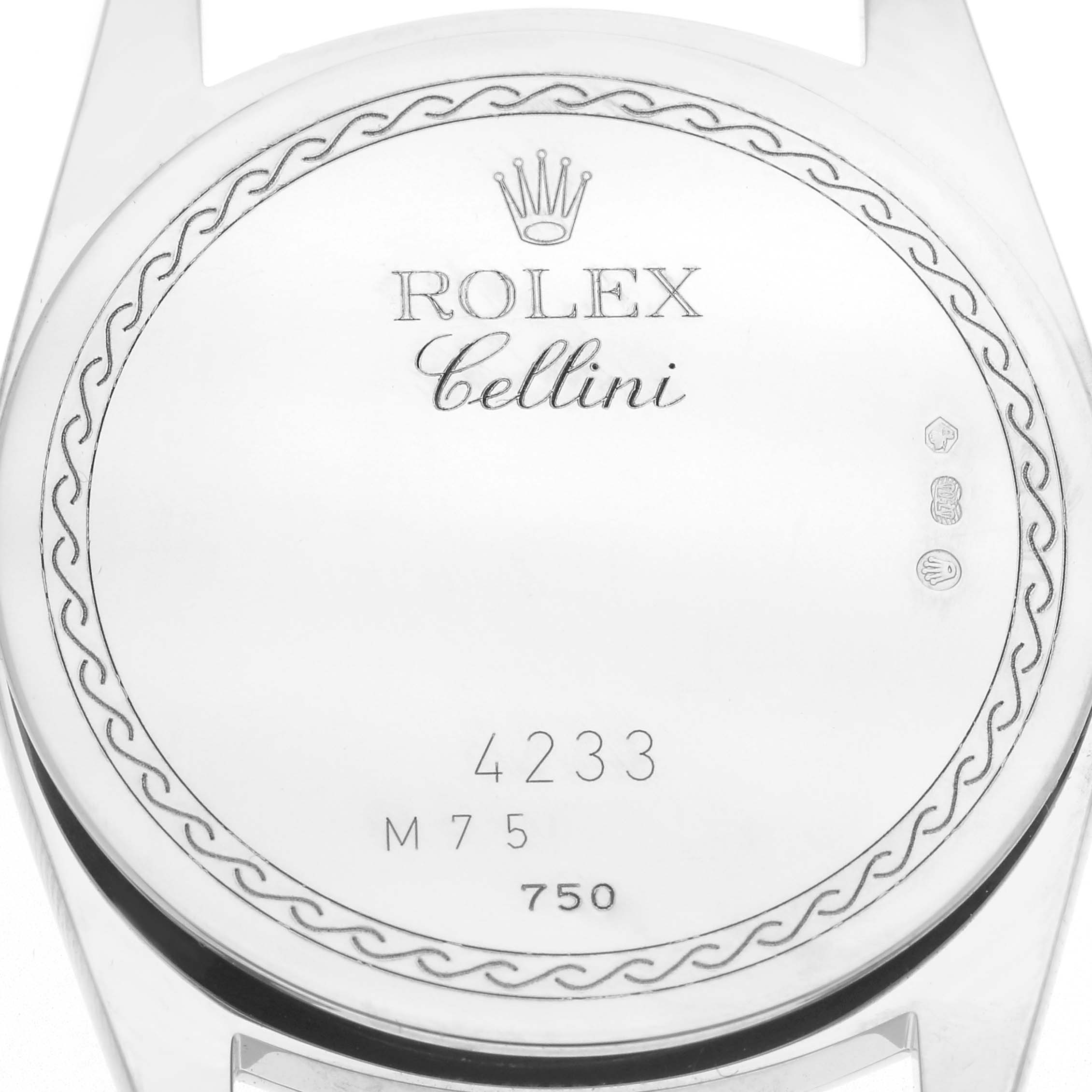 The image shows the back of a Rolex Cellini 4233/9BIC Men
s White Gold White Dial 4233/9BIC Men
s White Gold White Dial watch case, featuring engraving details and hallmarks.