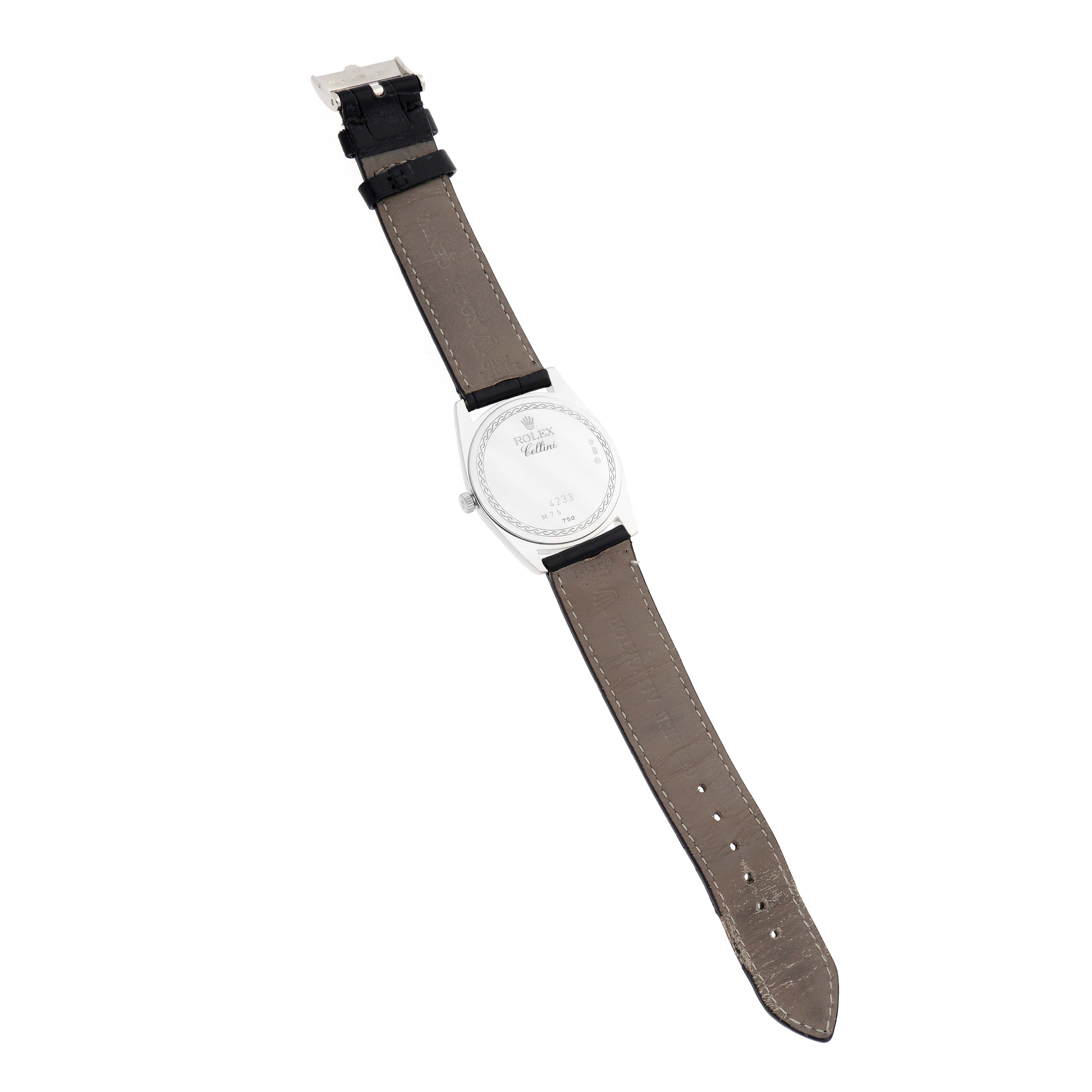 The Rolex Cellini 4233/9BIC Men
s White Gold White Dial 4233/9BIC Men
s White Gold White Dial watch is shown from the back, featuring its case back and leather strap.