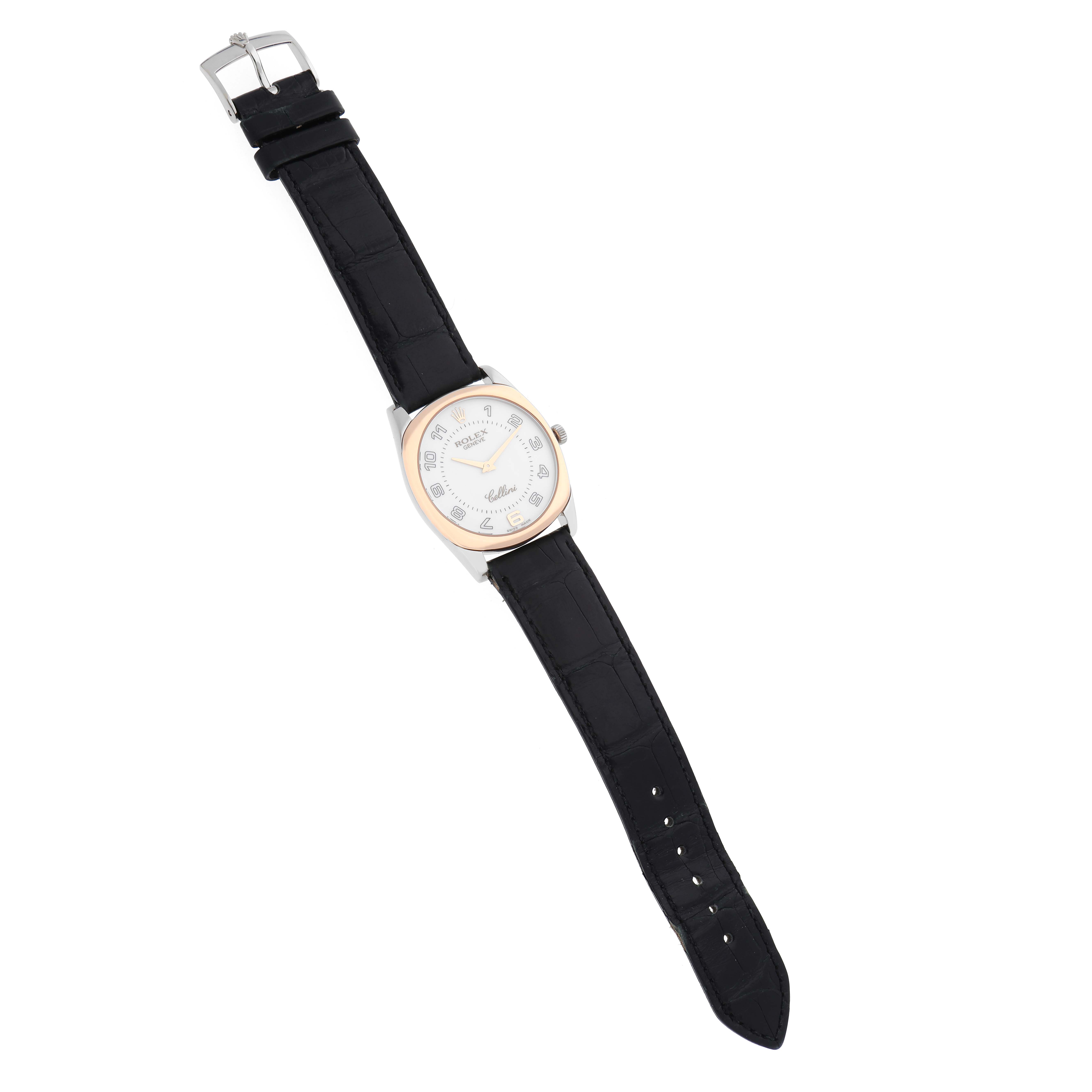 The Rolex Cellini 4233/9BIC Men
s White Gold White Dial 4233/9BIC Men
s White Gold White Dial watch is shown from a top view, displaying its black leather strap, round face, and clasp.