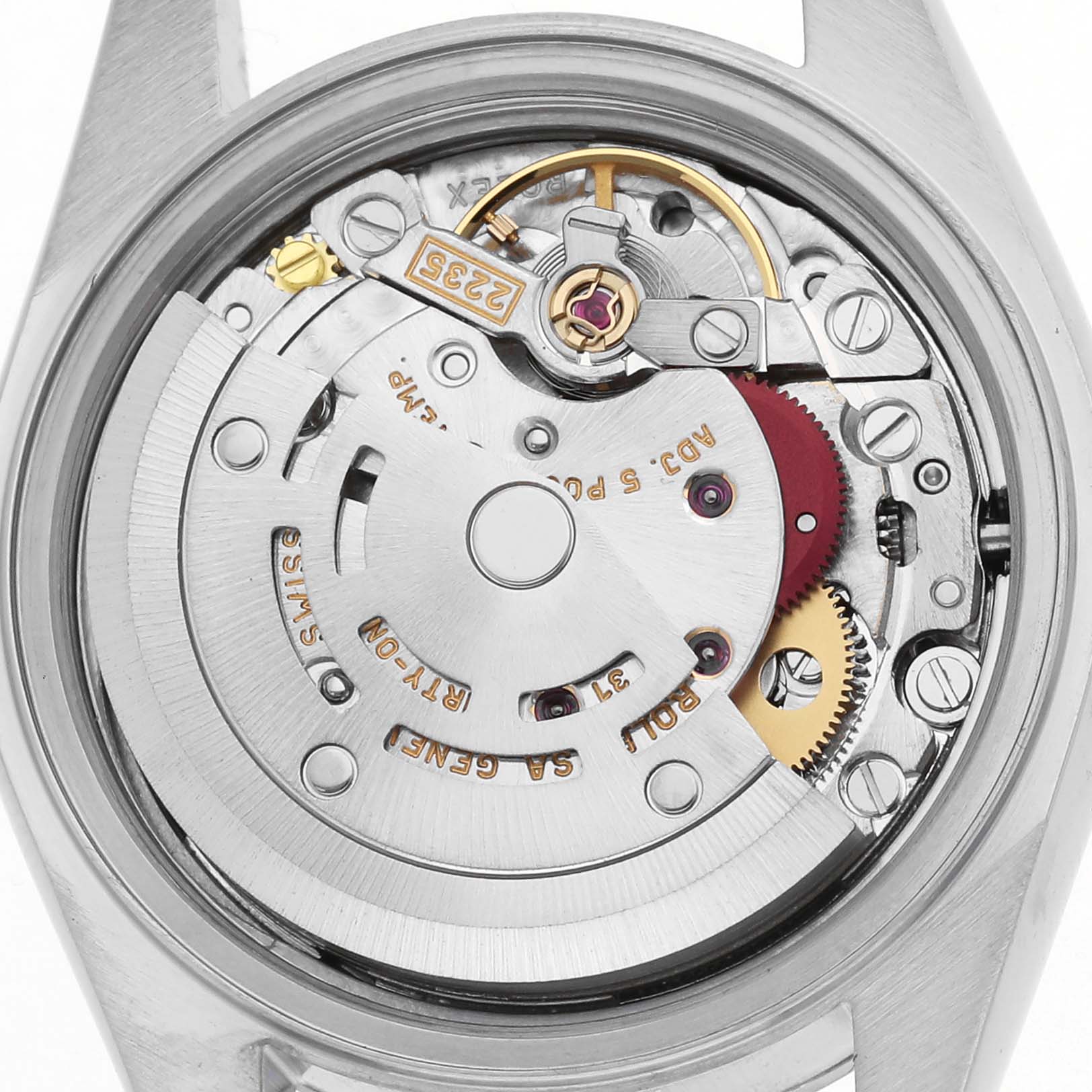 The image shows the movement of a Rolex Date 79160 Women
s Stainless Steel Pink Dial 79160 Women
s Stainless Steel Pink Dial watch from the back, highlighting gears and inscriptions.