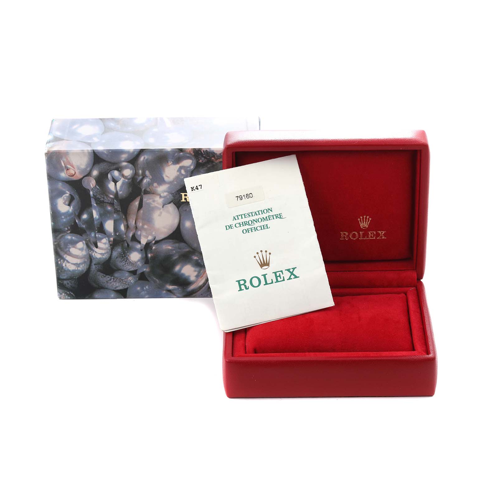 The image shows a red Rolex box for the Date model, with paperwork and an outer decorative box.