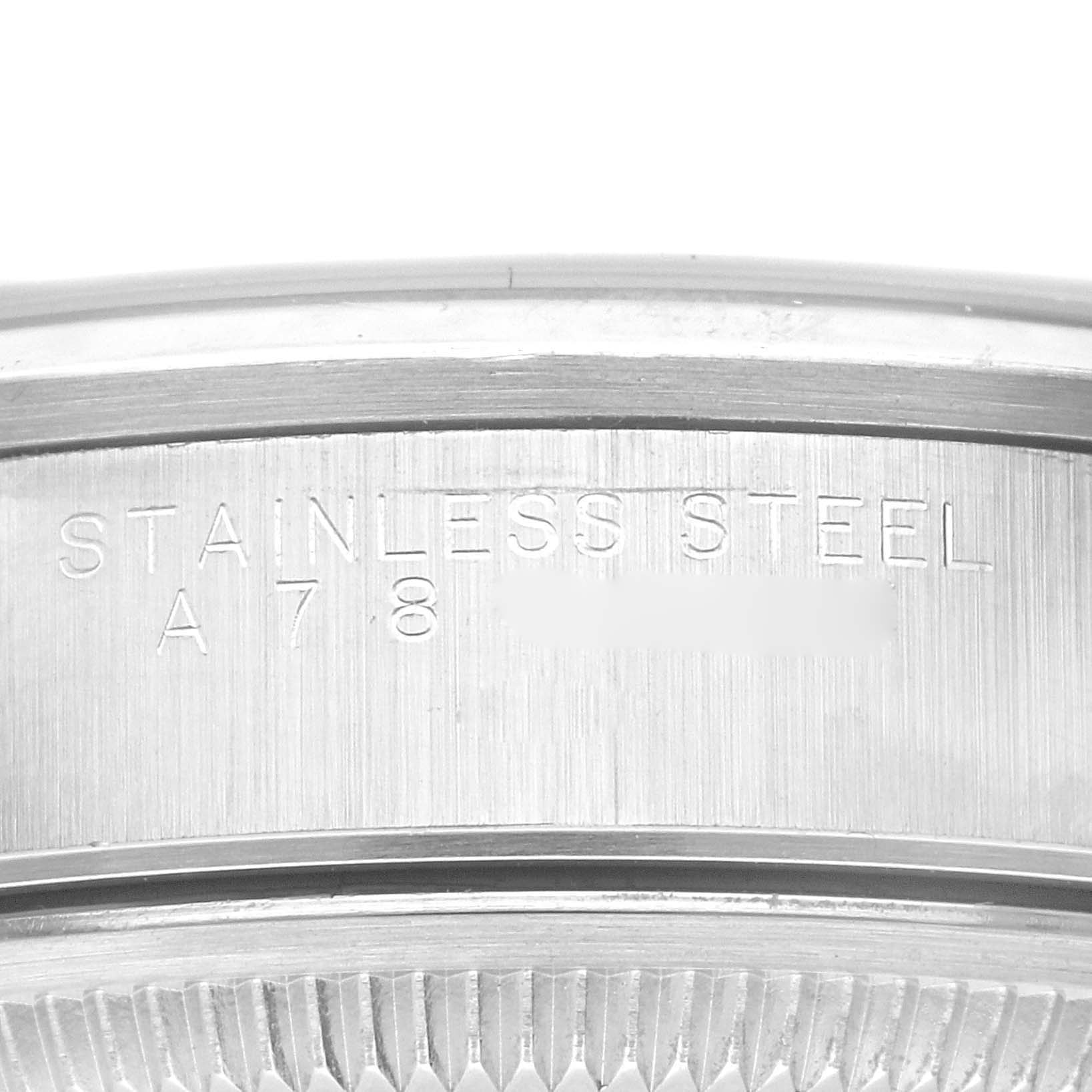 This close-up shows the stainless steel case back and serial number area of a Rolex Date 15200 Men's Stainless Steel Blue Dial 15200 Men's Stainless Steel Blue Dial model watch.