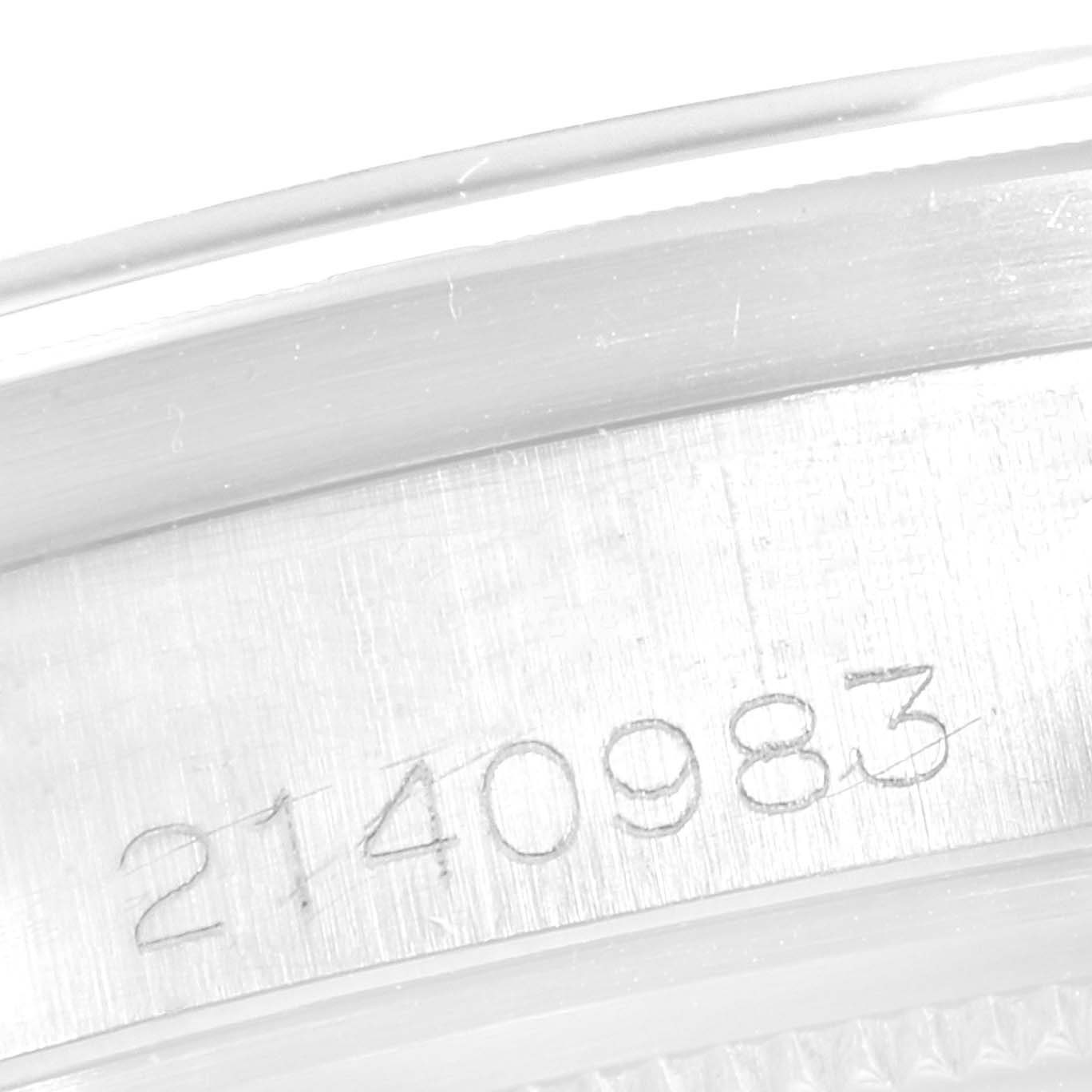 The image shows a close-up of the inner rim of a Vintage Collection Rolex watch, displaying its engraved serial number.