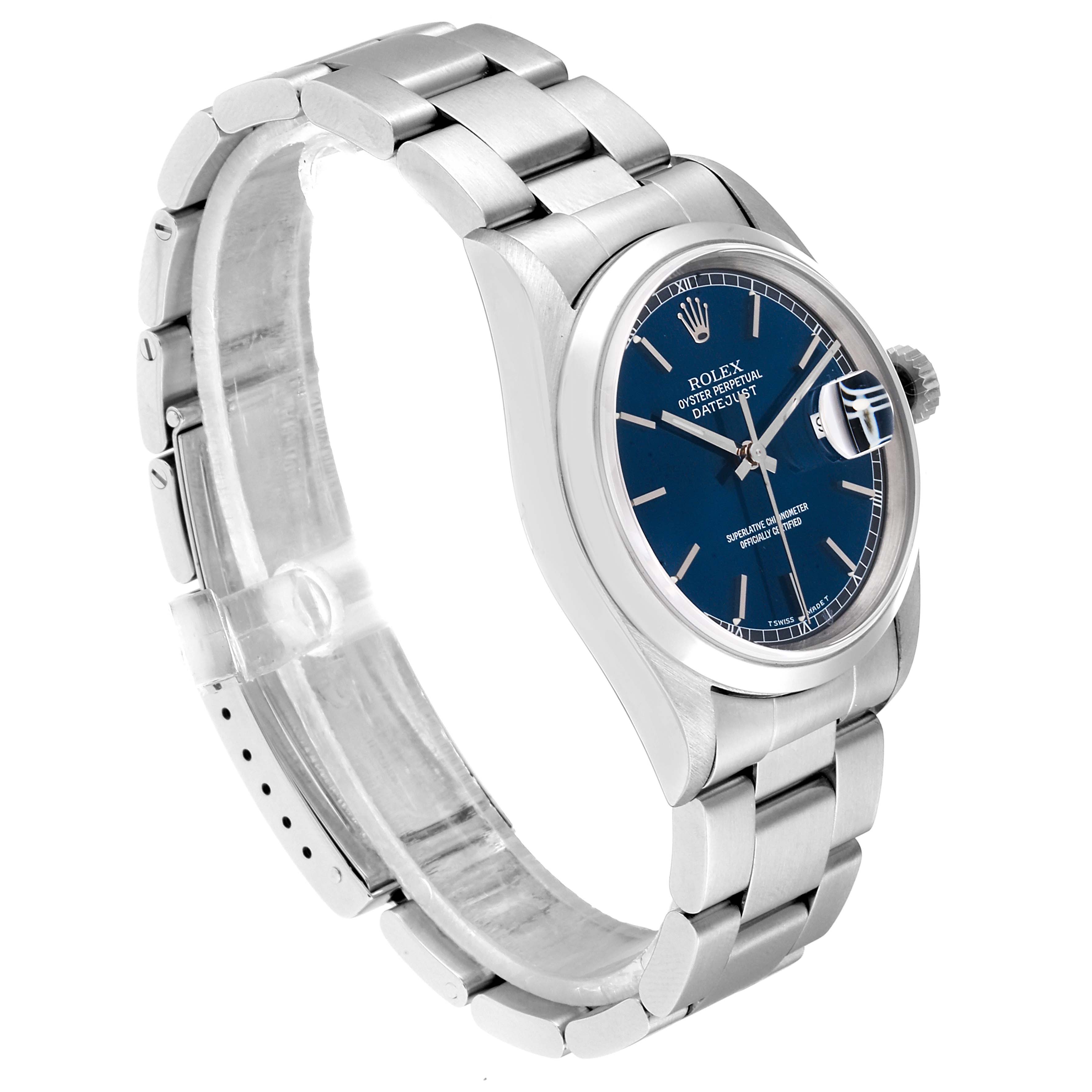 The image shows a side angle of a Rolex Datejust 16200 Men
s Stainless Steel Blue Dial 16200 Men
s Stainless Steel Blue Dial watch, highlighting its blue dial, oyster bracelet, and date magnification lens.