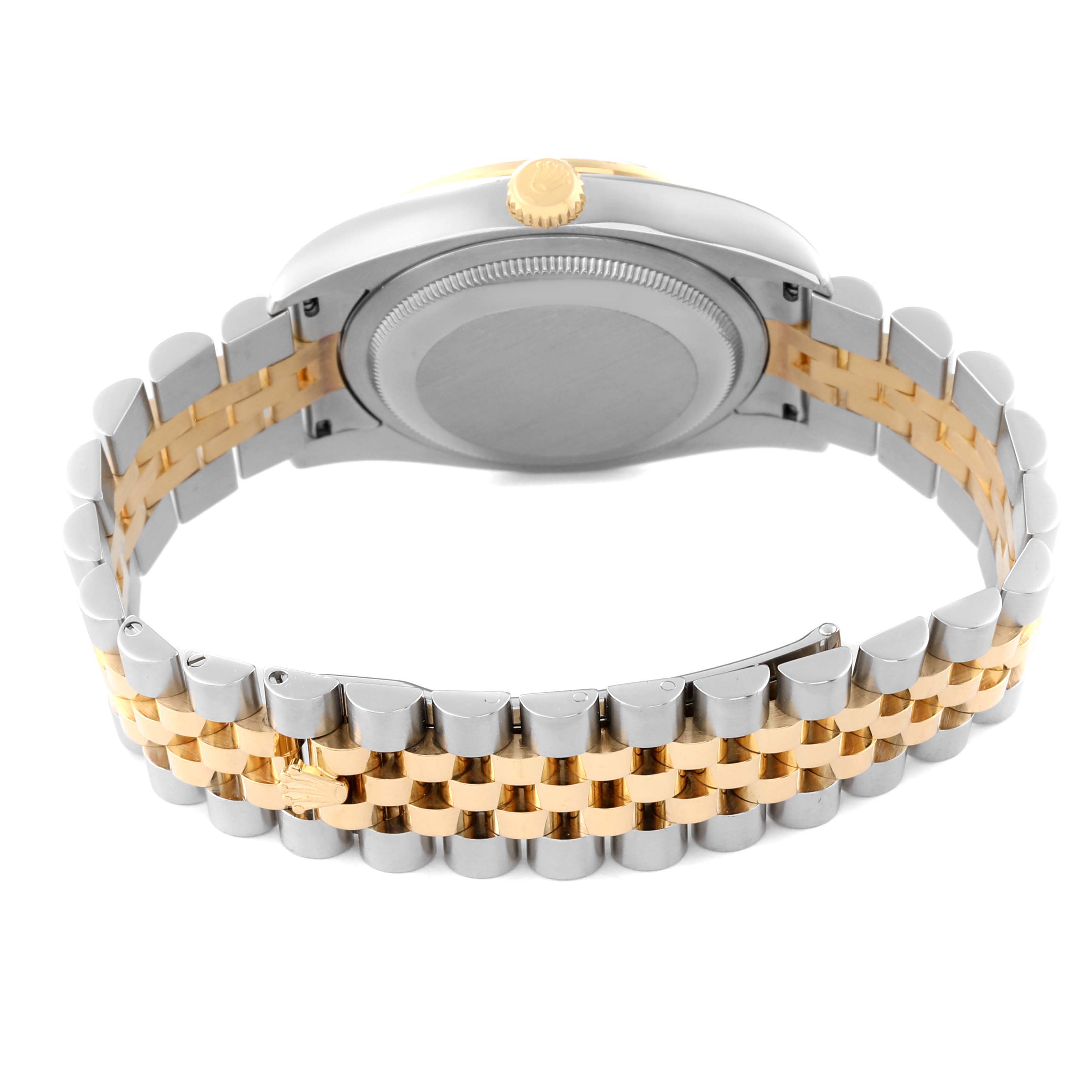 This image shows the back view of a Rolex Datejust 116243 Men's Steel and Gold (two tone) Champagne Dial 116243 Men's Steel and Gold (two tone) Champagne Dial watch, highlighting the case back and two-tone bracelet.