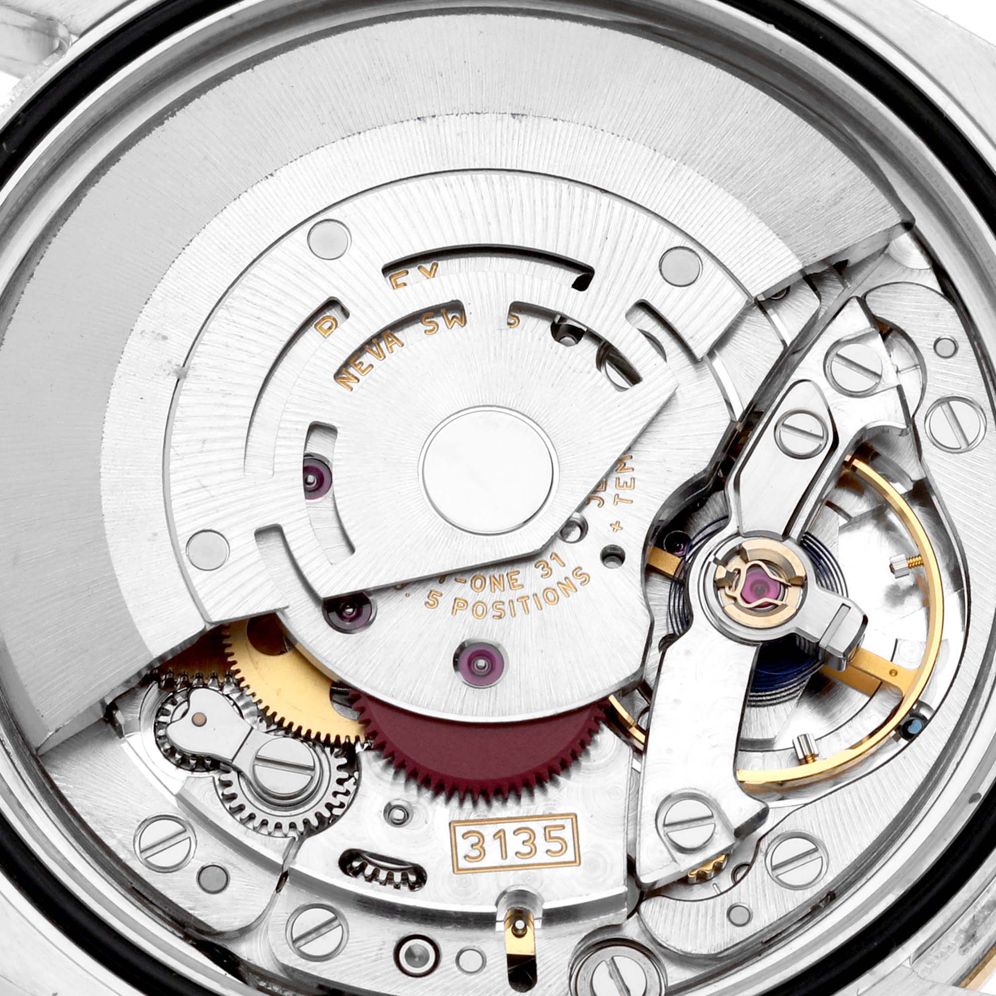 The image shows an interior, close-up view of the movement mechanism of a Rolex Datejust 116243 Men's Steel and Gold (two tone) Champagne Dial 116243 Men's Steel and Gold (two tone) Champagne Dial watch.