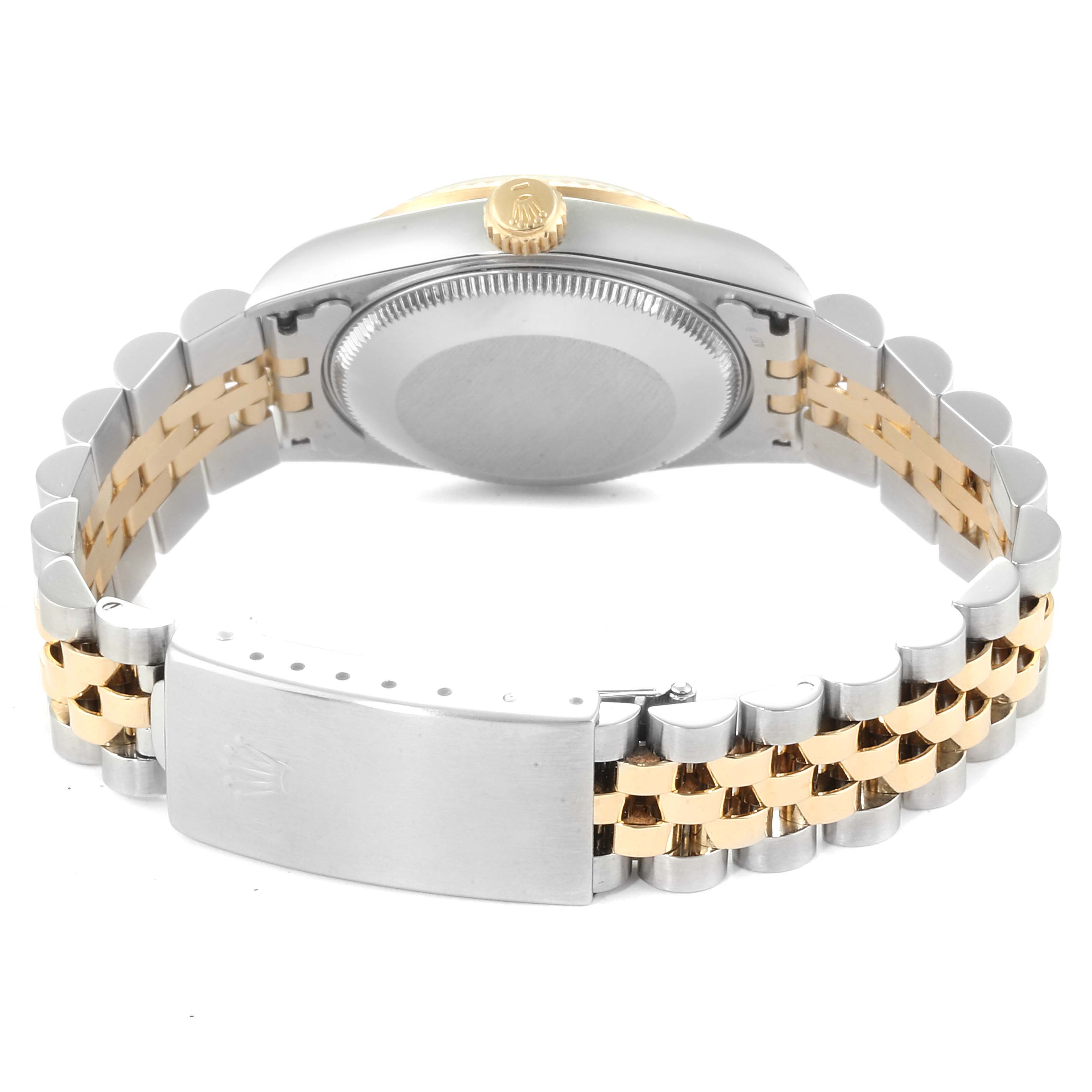 This image shows the back of the Rolex Mid-Size 68273 Women
s Steel and Gold (two tone) White Dial 68273 Women
s Steel and Gold (two tone) White Dial model watch, with a view of the bracelet, clasp, and case back.