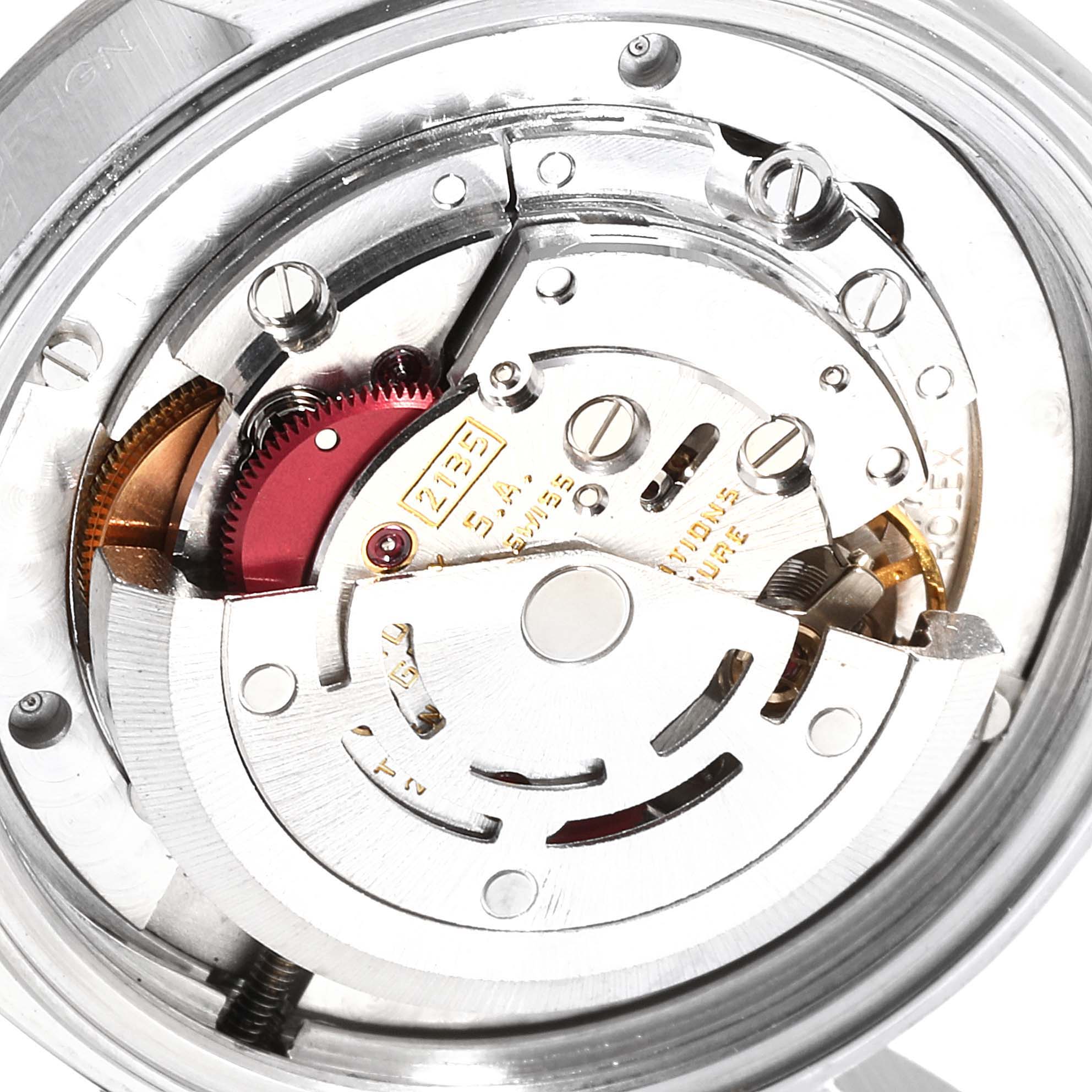 This image depicts the intricate internal mechanism of a Rolex Mid-Size 68274 Women
s Stainless Steel Silver Dial 68274 Women
s Stainless Steel Silver Dial model watch from a close-up angle.