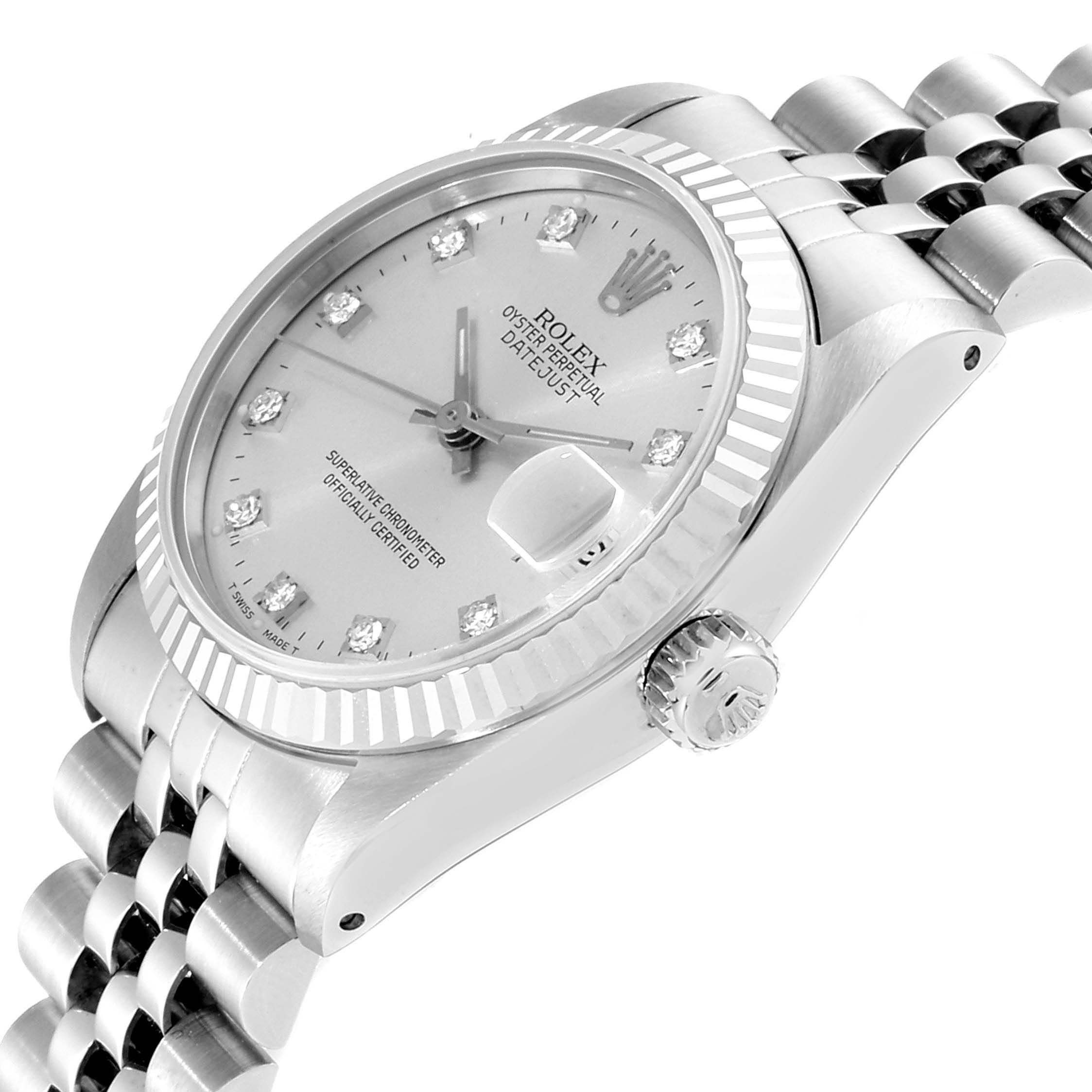 This Rolex Mid-Size 68274 Women
s Stainless Steel Silver Dial 68274 Women
s Stainless Steel Silver Dial watch is viewed from a slight angle displaying the face, fluted bezel, crown, and bracelet.