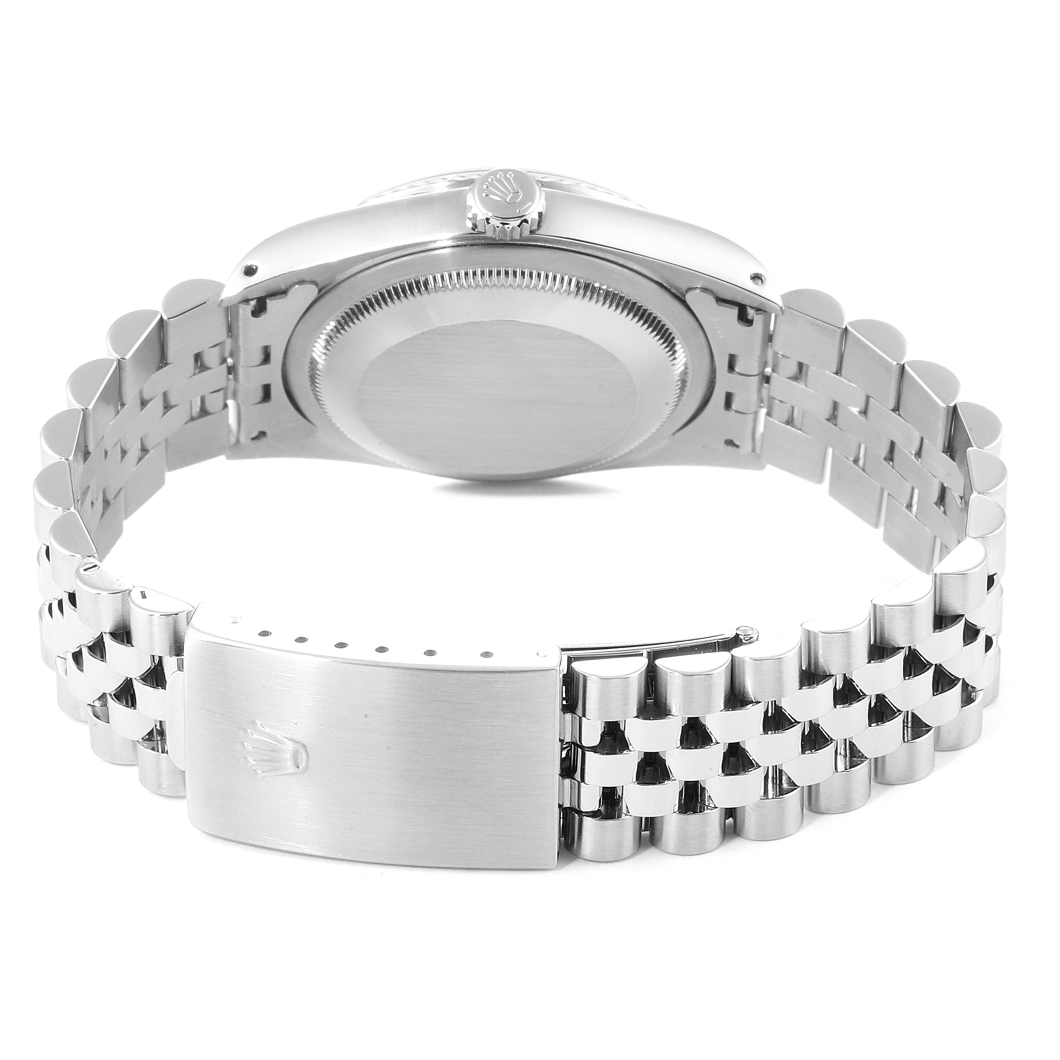 This image shows the back view of a Rolex Datejust 16234 Men's Stainless Steel Silver Dial 16234 Men's Stainless Steel Silver Dial watch, highlighting its bracelet, clasp, and case back.