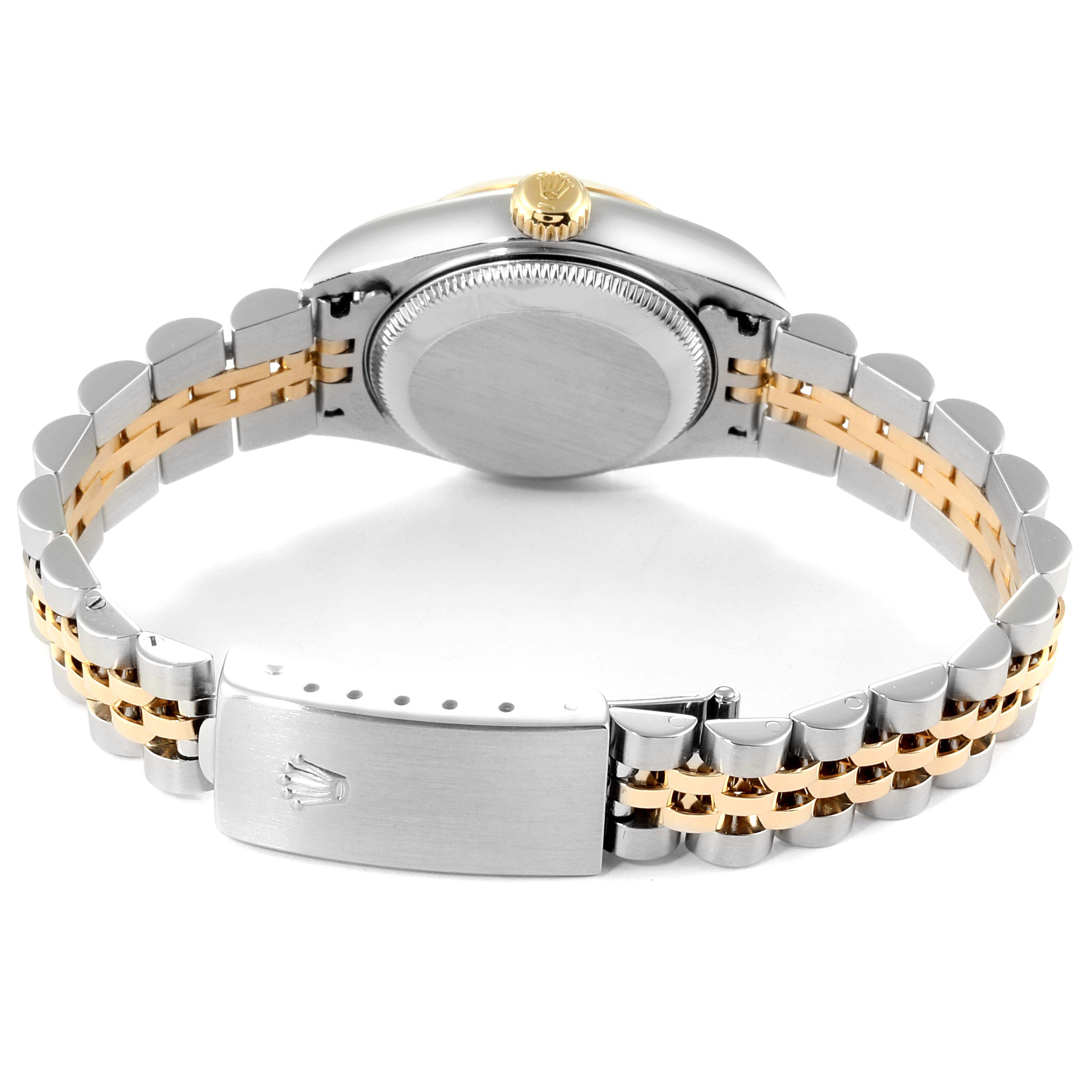 This image shows the back of a Rolex Datejust 79173 Women
s Steel and Gold (two tone) Champagne Dial 79173 Women
s Steel and Gold (two tone) Champagne Dial watch, highlighting the case back, crown, and Jubilee bracelet with a clasp.