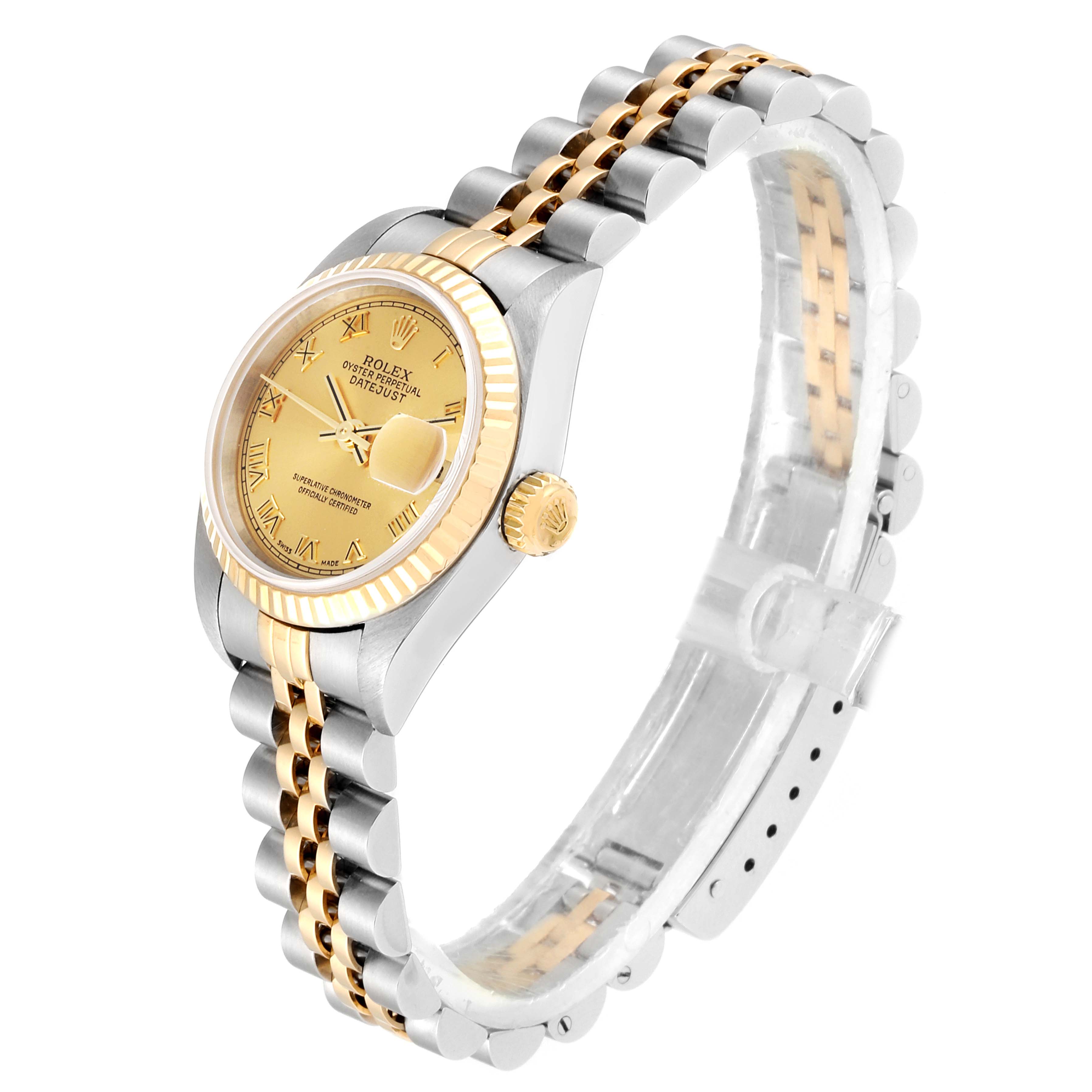 This image shows a Rolex Datejust 79173 Women
s Steel and Gold (two tone) Champagne Dial 79173 Women
s Steel and Gold (two tone) Champagne Dial watch from a slightly angled side view, displaying its dial, bezel, crown, and bracelet.