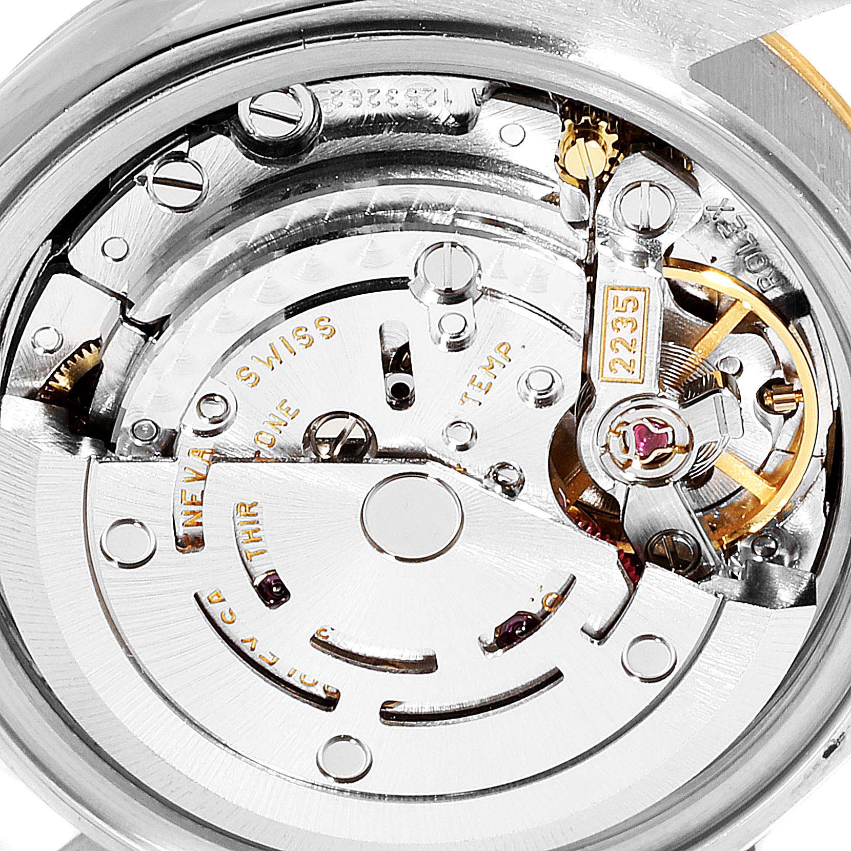 This image shows the intricate inner workings and movement of a Rolex Datejust 79173 Women
s Steel and Gold (two tone) Champagne Dial 79173 Women
s Steel and Gold (two tone) Champagne Dial watch from a close-up angle.