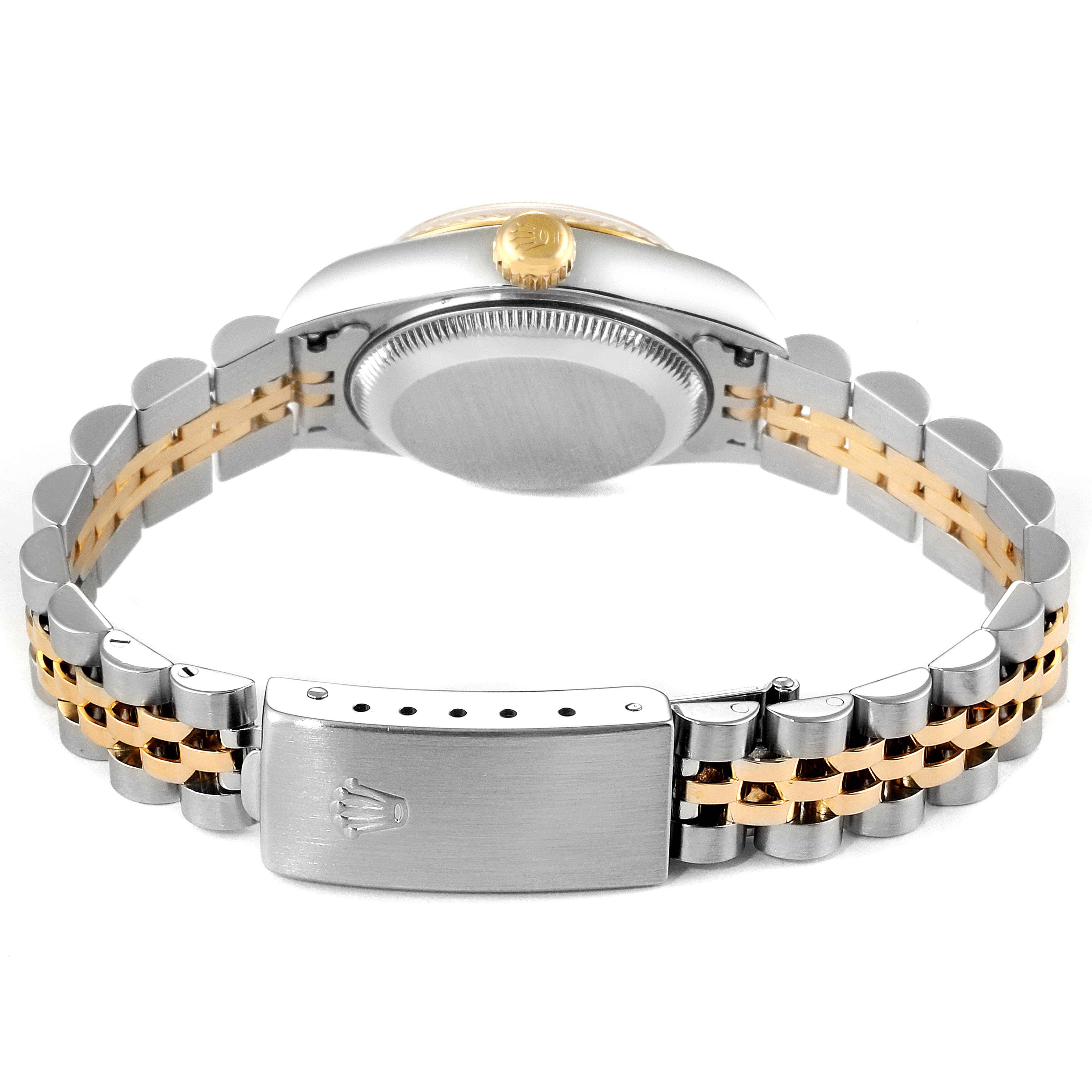 This image shows the back view of a Rolex Datejust 79173 Women
s Steel and Gold (two tone) Champagne Dial 79173 Women
s Steel and Gold (two tone) Champagne Dial watch, highlighting its clasp and bracelet.