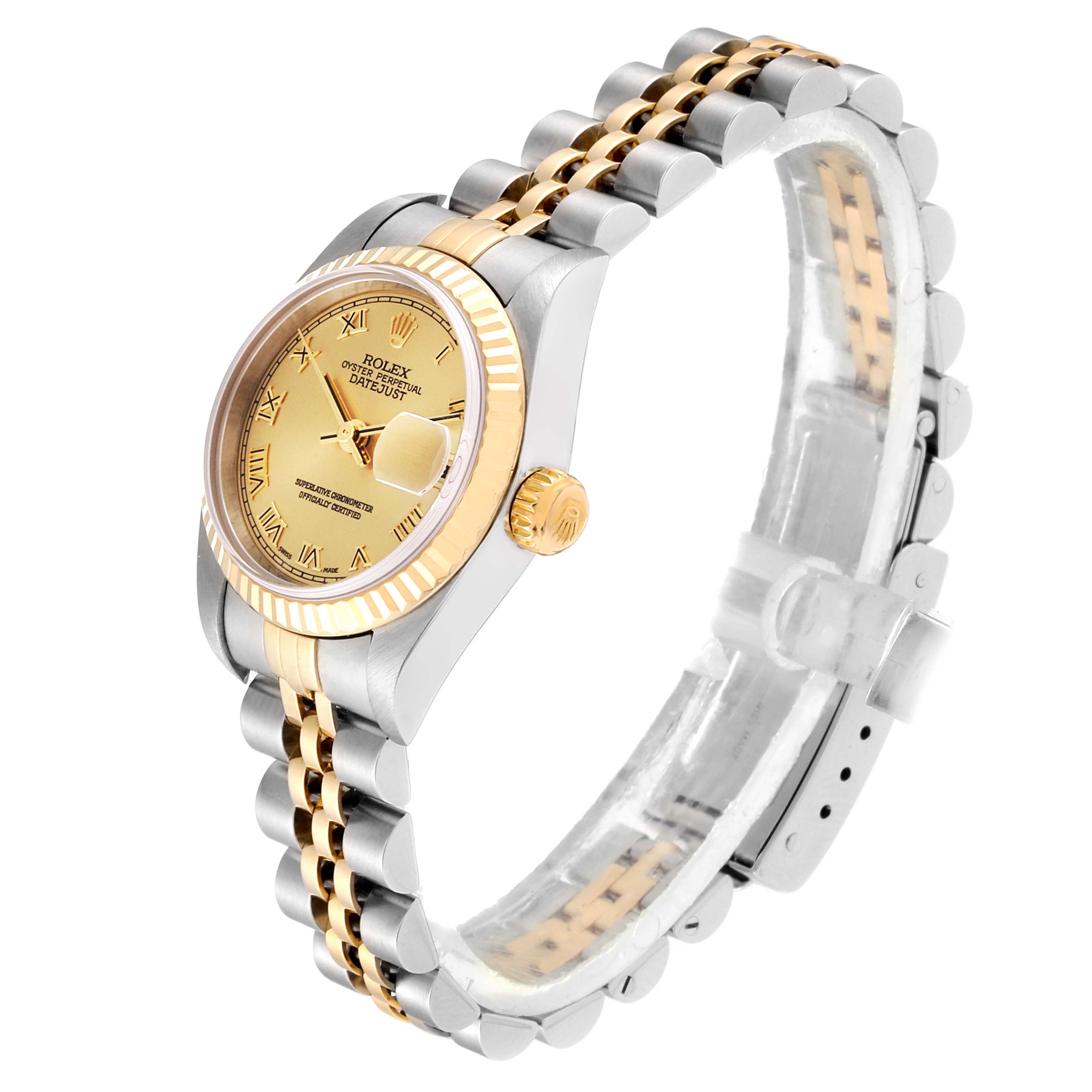 This image shows a Rolex Datejust 79173 Women
s Steel and Gold (two tone) Champagne Dial 79173 Women
s Steel and Gold (two tone) Champagne Dial watch angled to display its gold dial, fluted bezel, and jubilee bracelet.