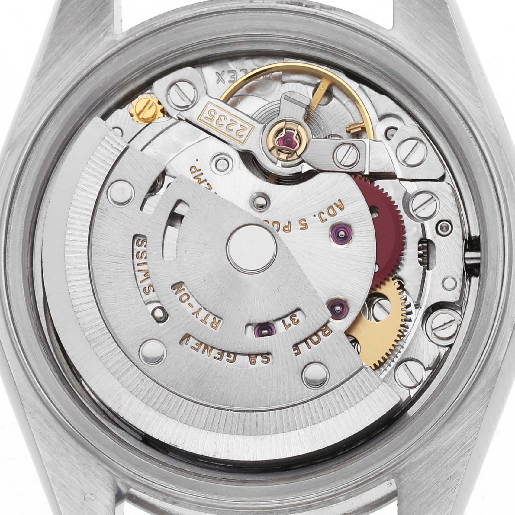 The image shows the movement of a Rolex Datejust 79174 Women
s Stainless Steel Pink Dial 79174 Women
s Stainless Steel Pink Dial watch, focusing on its intricate mechanical components from the back.