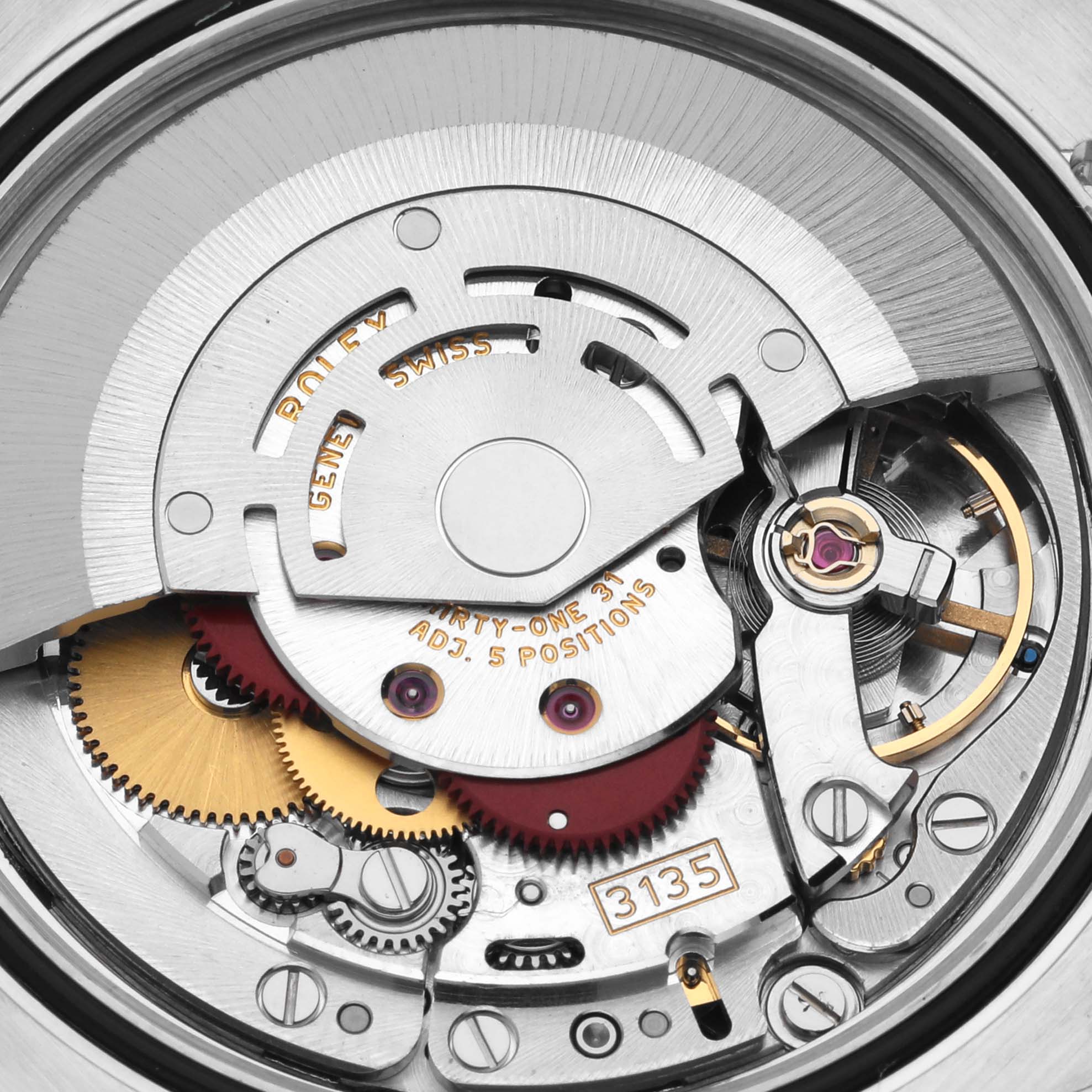 This image provides a detailed view of the movement mechanism inside a Rolex Datejust 116233 Men's Steel and Gold (two tone) Champagne Dial 116233 Men's Steel and Gold (two tone) Champagne Dial watch, showing its intricate components and parts.