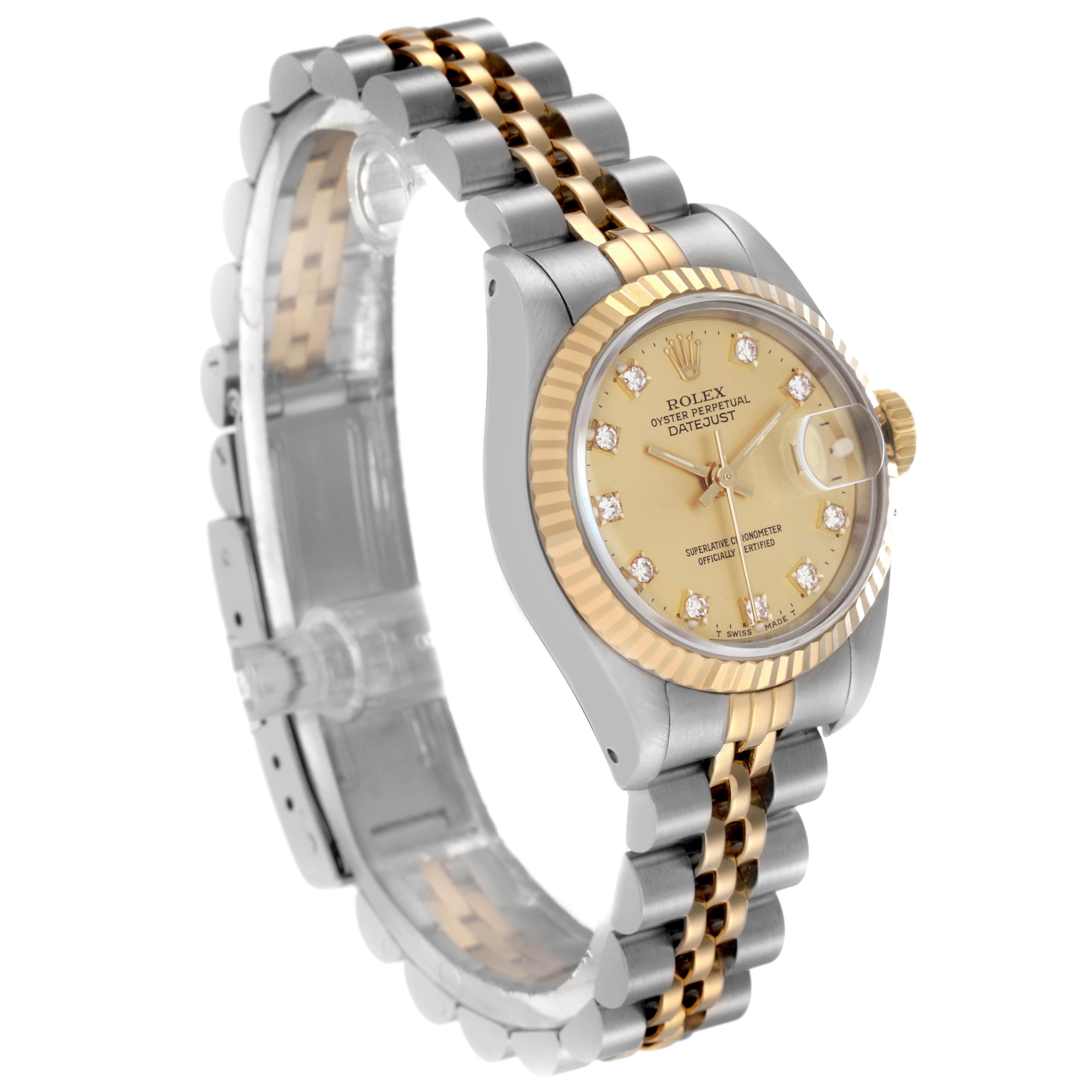 The Rolex Datejust 69173 Women
s Steel and Gold (two tone) Champagne Dial 69173 Women
s Steel and Gold (two tone) Champagne Dial watch is shown at a three-quarter angle, highlighting the dial, bezel, and two-tone bracelet.