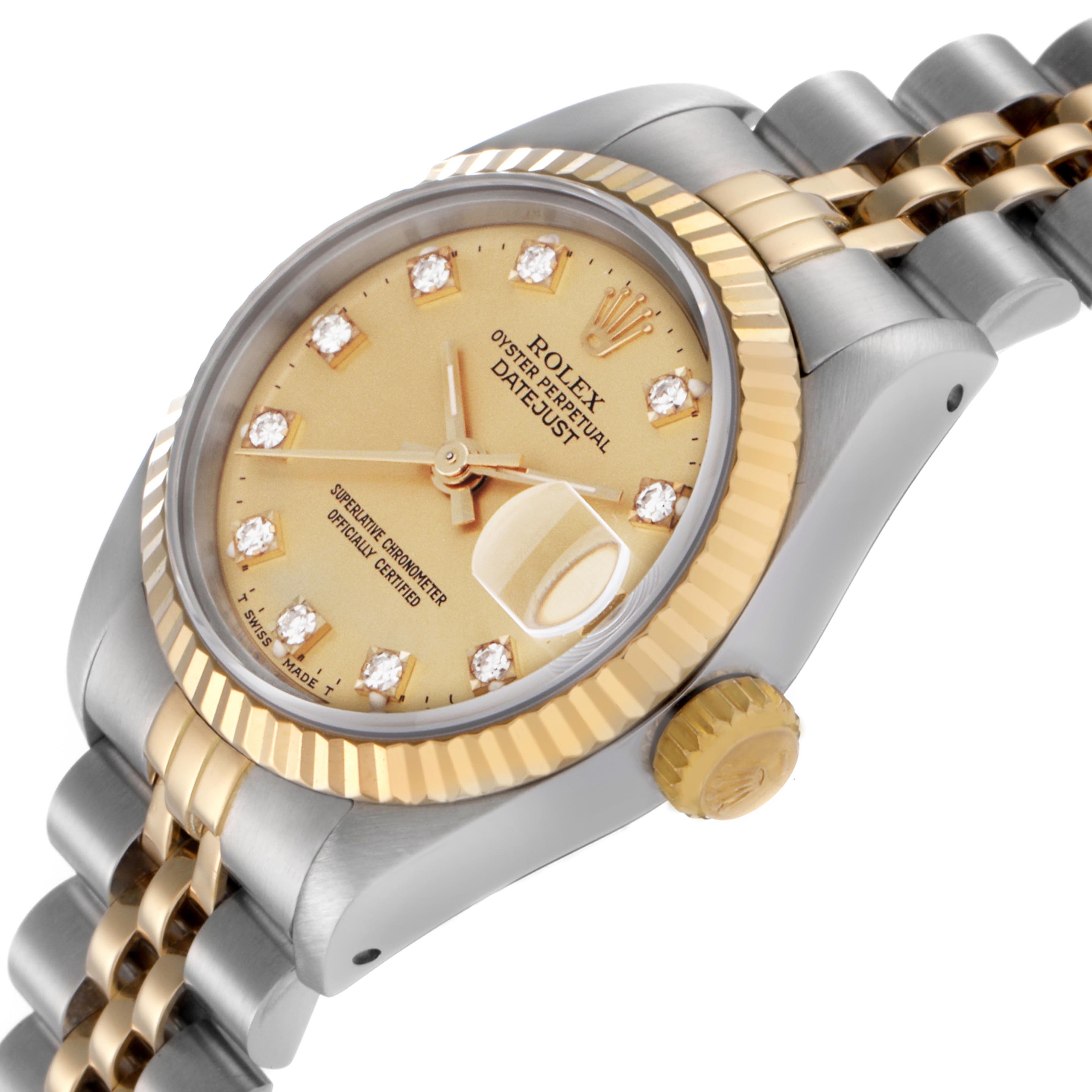 The Rolex Datejust 69173 Women
s Steel and Gold (two tone) Champagne Dial 69173 Women
s Steel and Gold (two tone) Champagne Dial watch is shown at an angled view displaying its gold dial, diamond hour markers, fluted bezel, and Jubilee bracelet.