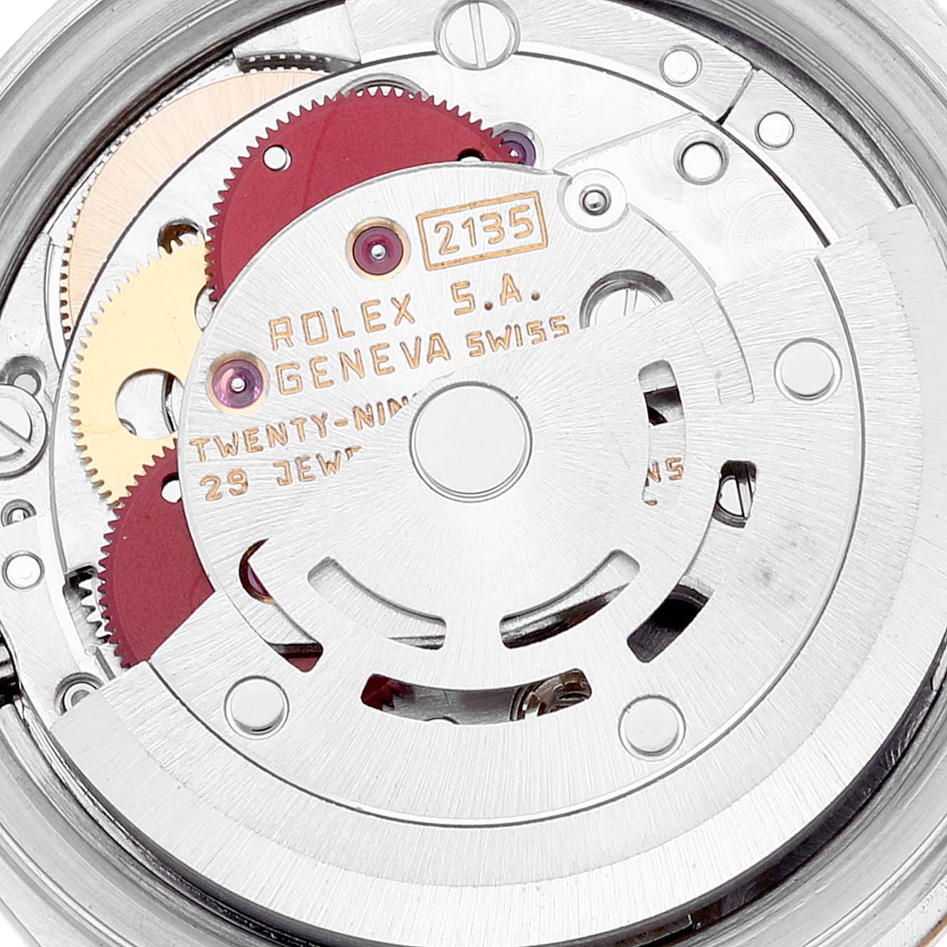 This image displays a close-up of the movement and internal gears of a Rolex Datejust 69173 Women's Steel and Gold (two tone) White Dial 69173 Women's Steel and Gold (two tone) White Dial watch.