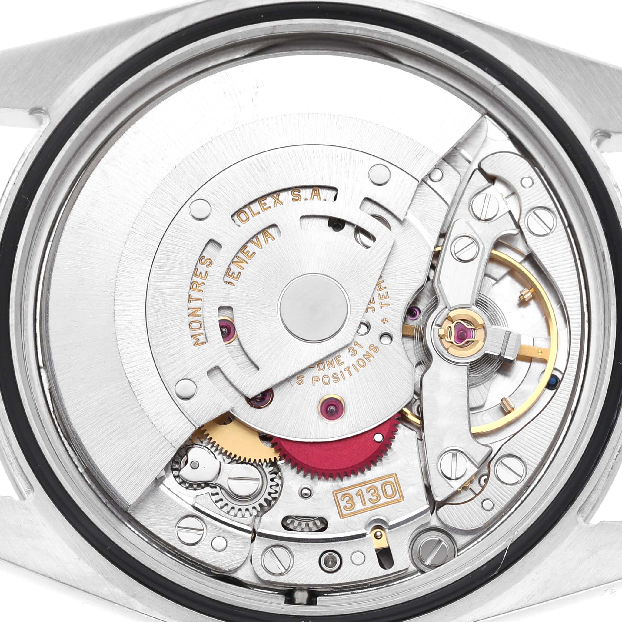 This image shows the intricate inner workings of a Rolex Explorer 114270 Men's Stainless Steel Black Dial, featuring its movement and components.