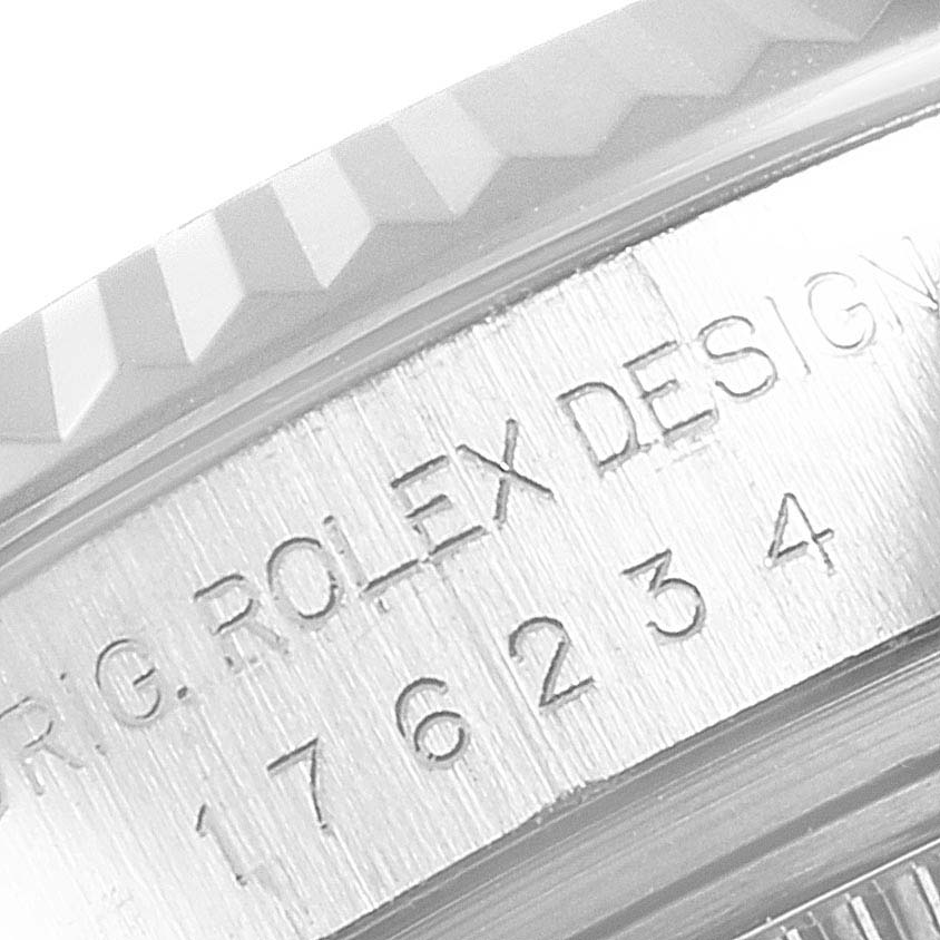 This close-up shows the embossed lettering and model number on the case of the Rolex Oyster Perpetual 176234 Women's Stainless Steel Silver Dial 176234 Women's Stainless Steel Silver Dial watch.
