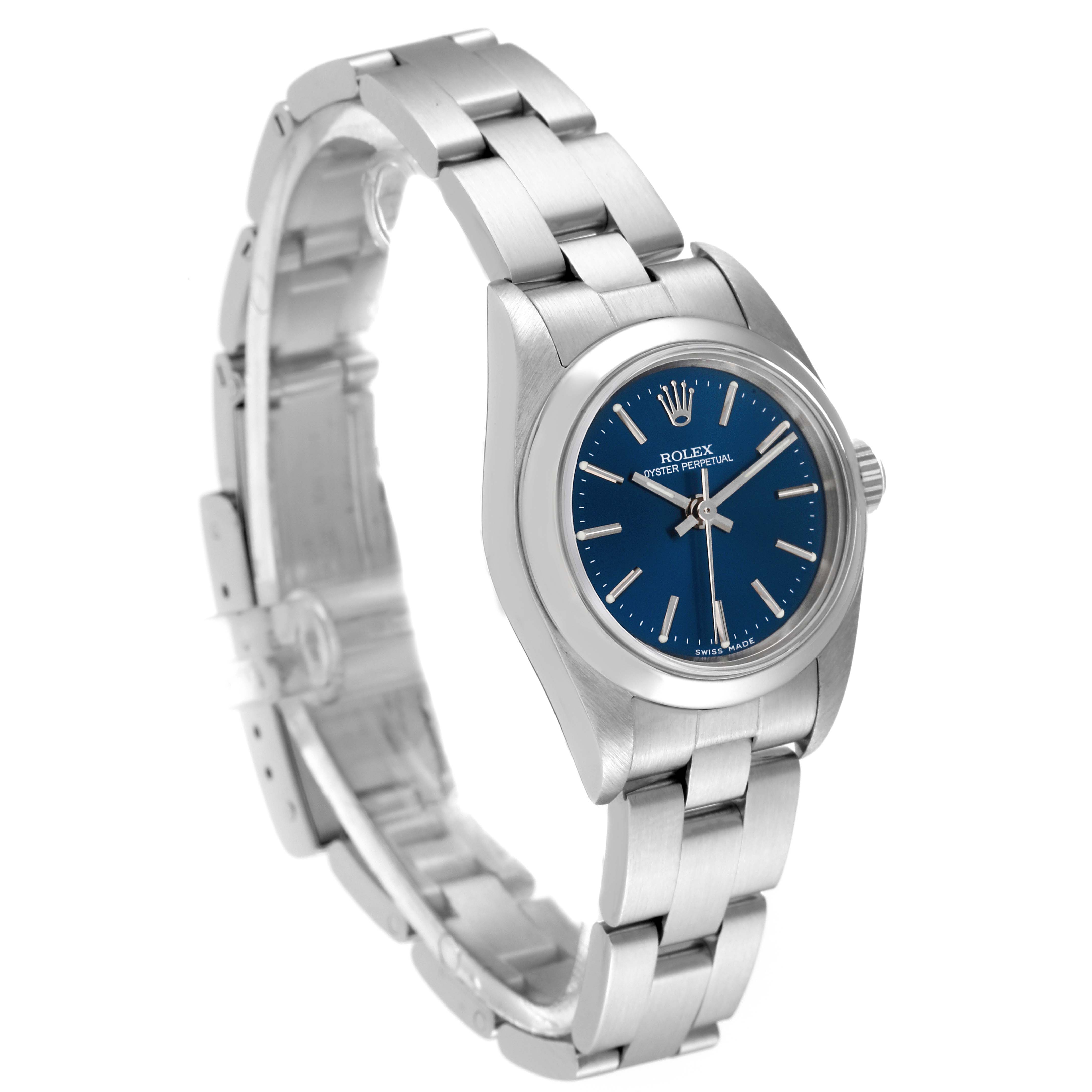 This image shows a Rolex Oyster Perpetual 76080 Women's Stainless Steel Blue Dial 76080 Women's Stainless Steel Blue Dial watch angled slightly from the top right, highlighting the dial, bezel, and bracelet.