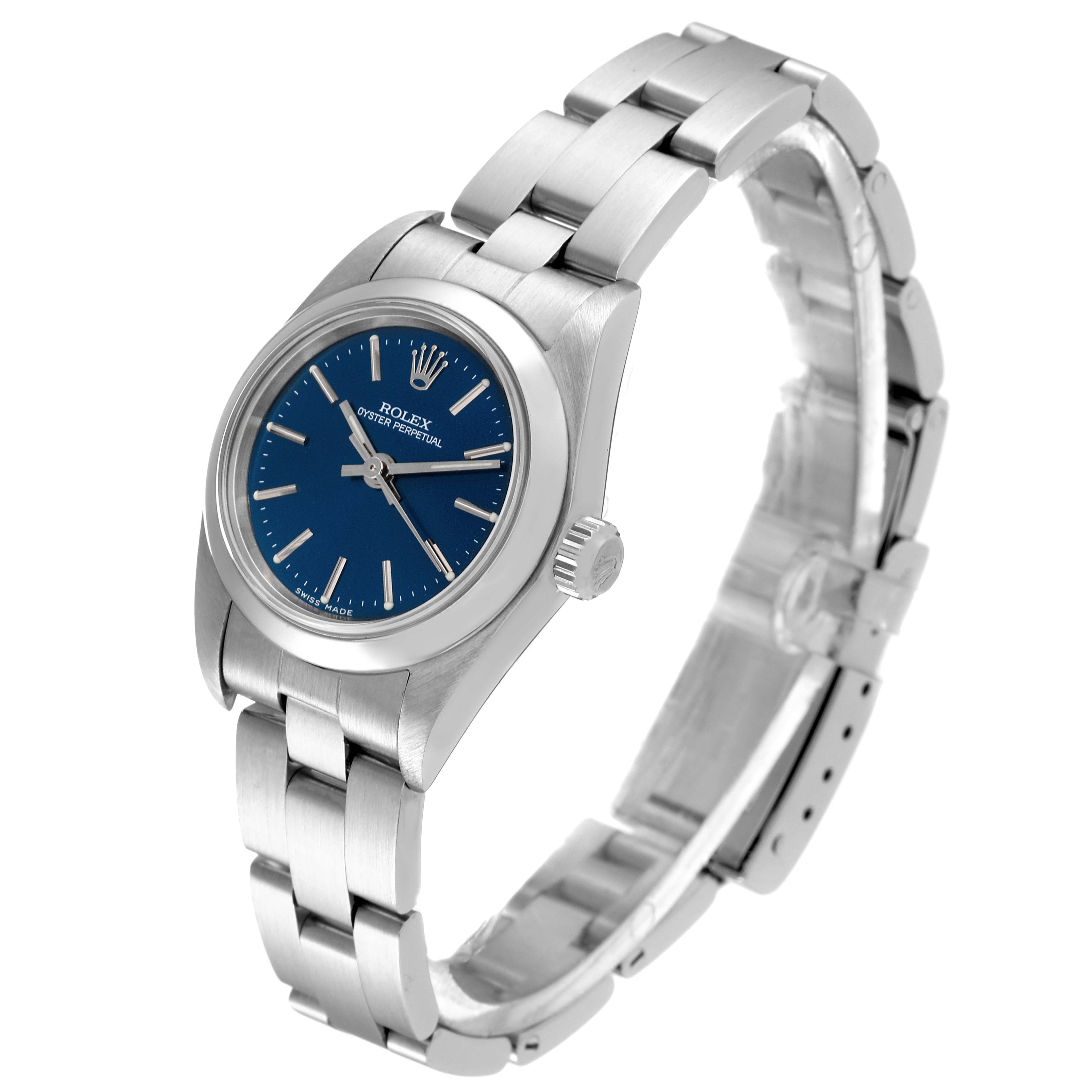 The image shows a Rolex Oyster Perpetual 76080 Women's Stainless Steel Blue Dial 76080 Women's Stainless Steel Blue Dial watch at a slight angle displaying the face, crown, and part of the bracelet.