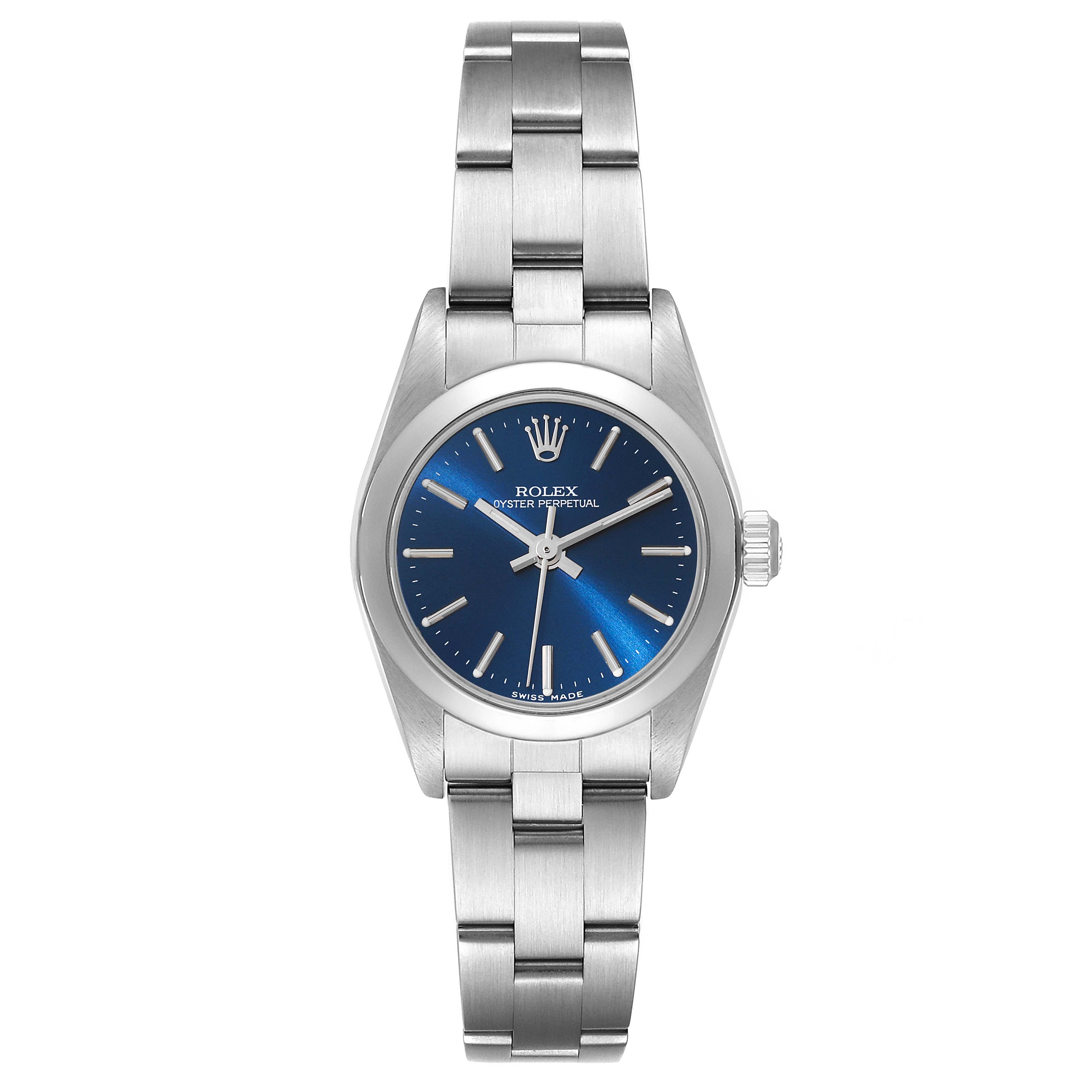 The Rolex Oyster Perpetual 76080 Women's Stainless Steel Blue Dial 76080 Women's Stainless Steel Blue Dial watch is shown from a top-down angle, displaying the face, bracelet, and crown.
