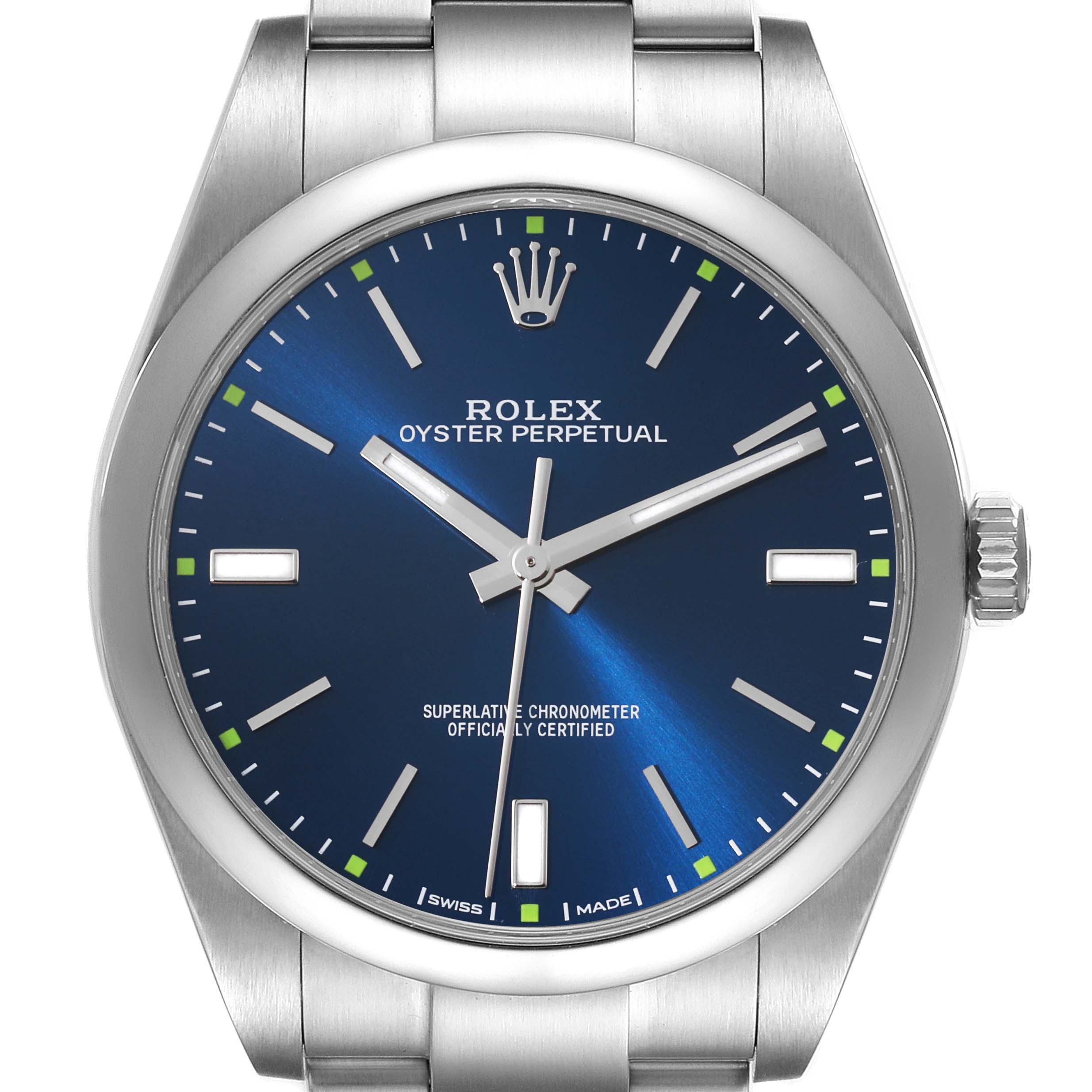 The image shows a front view of a Rolex Oyster Perpetual 114300 Men's Stainless Steel Blue Dial 114300 Men's Stainless Steel Blue Dial watch, highlighting its blue dial, hour markers, and stainless steel bracelet.