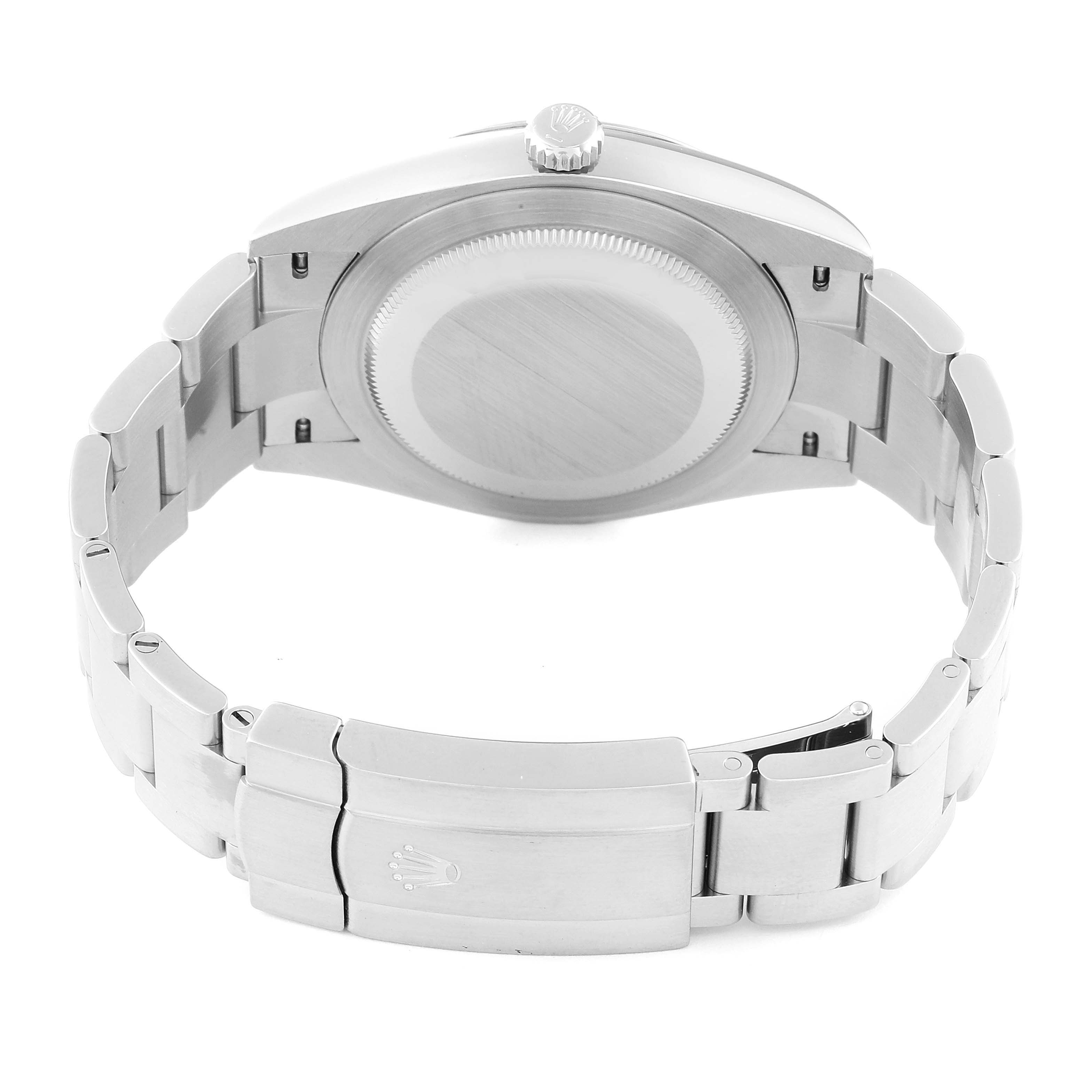 This image shows the back view of a Rolex Oyster Perpetual 124300 Men
s Stainless Steel Red Dial 124300 Men
s Stainless Steel Red Dial watch, highlighting its stainless steel case back and bracelet.