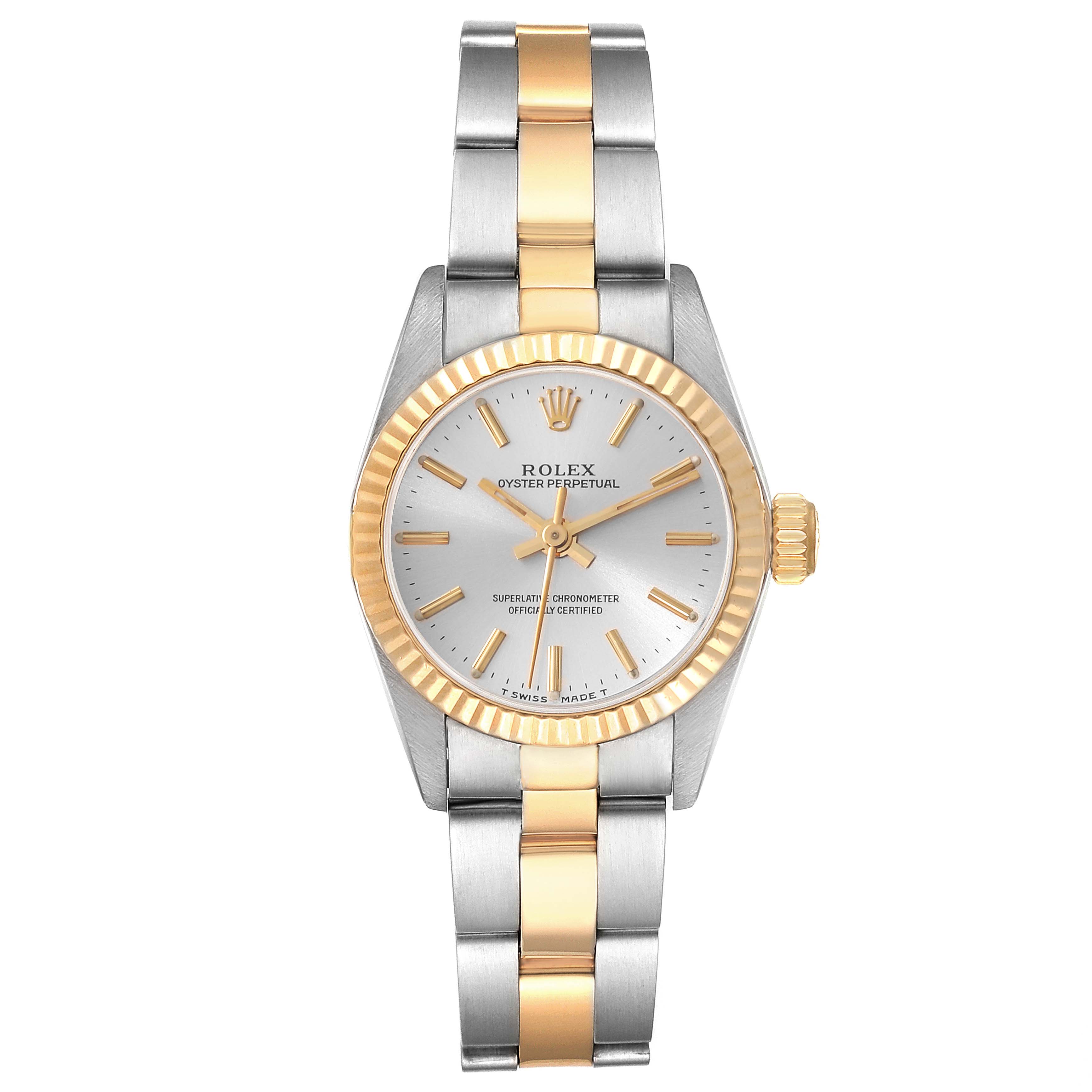 The Rolex Oyster Perpetual 67193 Women's Steel and Gold (two tone) Silver Dial 67193 Women's Steel and Gold (two tone) Silver Dial watch is shown from a top-down angle, highlighting its silver and gold two-tone design and fluted bezel.