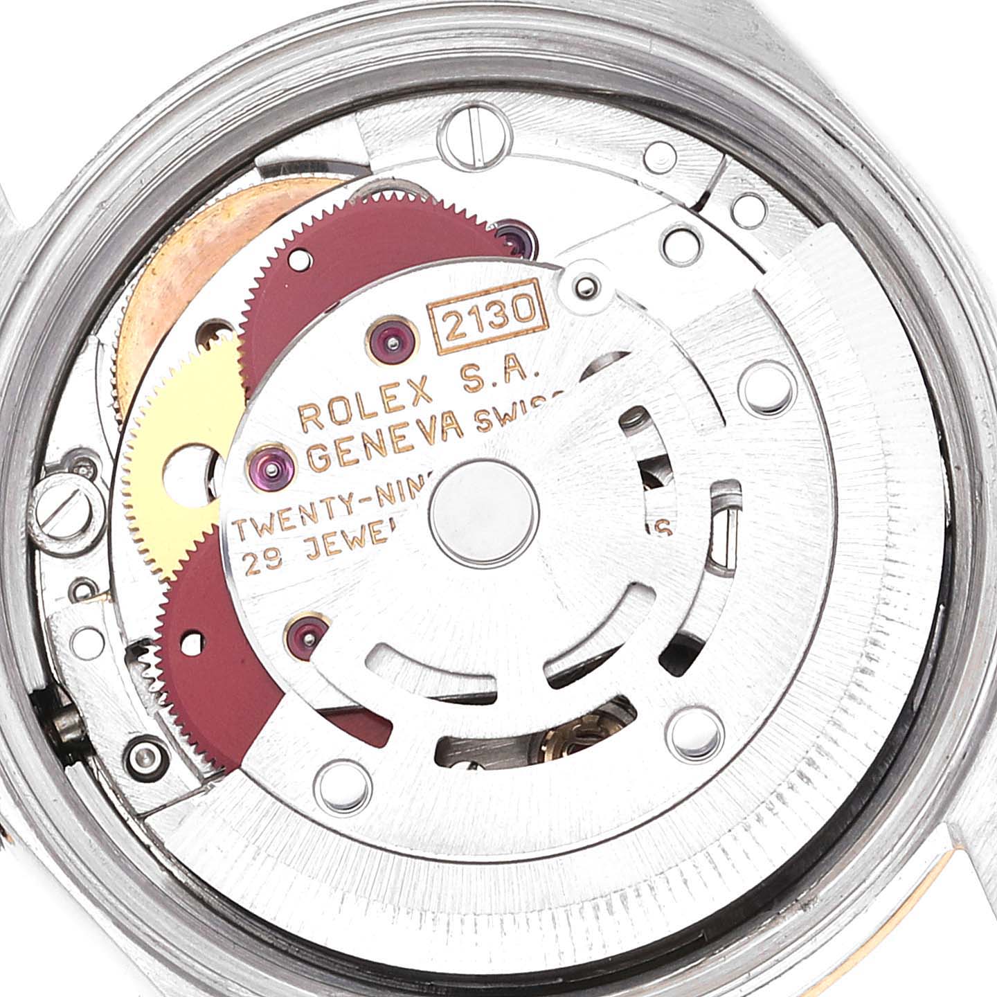 This is a close-up view of the movement mechanism of a Rolex Oyster Perpetual 67193 Women's Steel and Gold (two tone) Silver Dial 67193 Women's Steel and Gold (two tone) Silver Dial watch, showcasing its intricate inner workings.