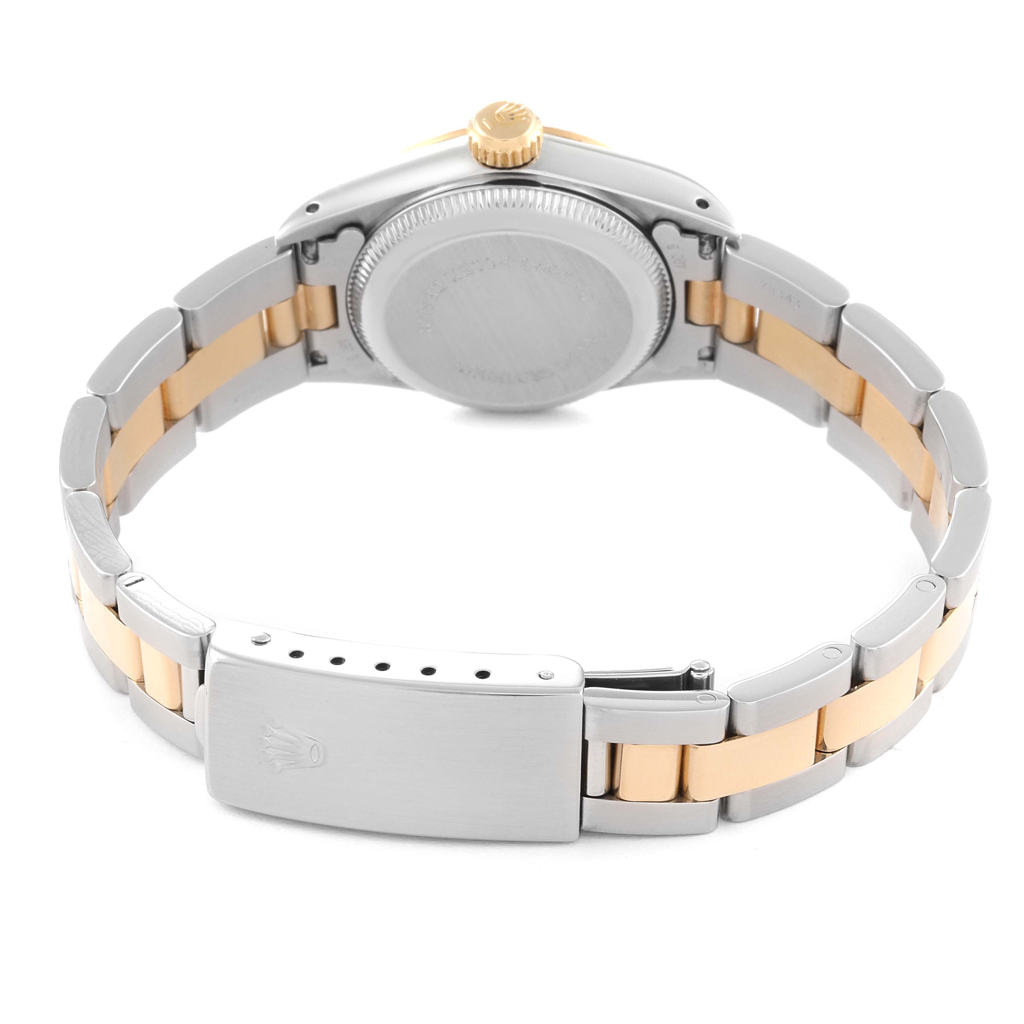 The image shows the back view of a Rolex Oyster Perpetual 67193 Women's Steel and Gold (two tone) Silver Dial 67193 Women's Steel and Gold (two tone) Silver Dial watch, highlighting its clasp, bracelet, case back, and crown.
