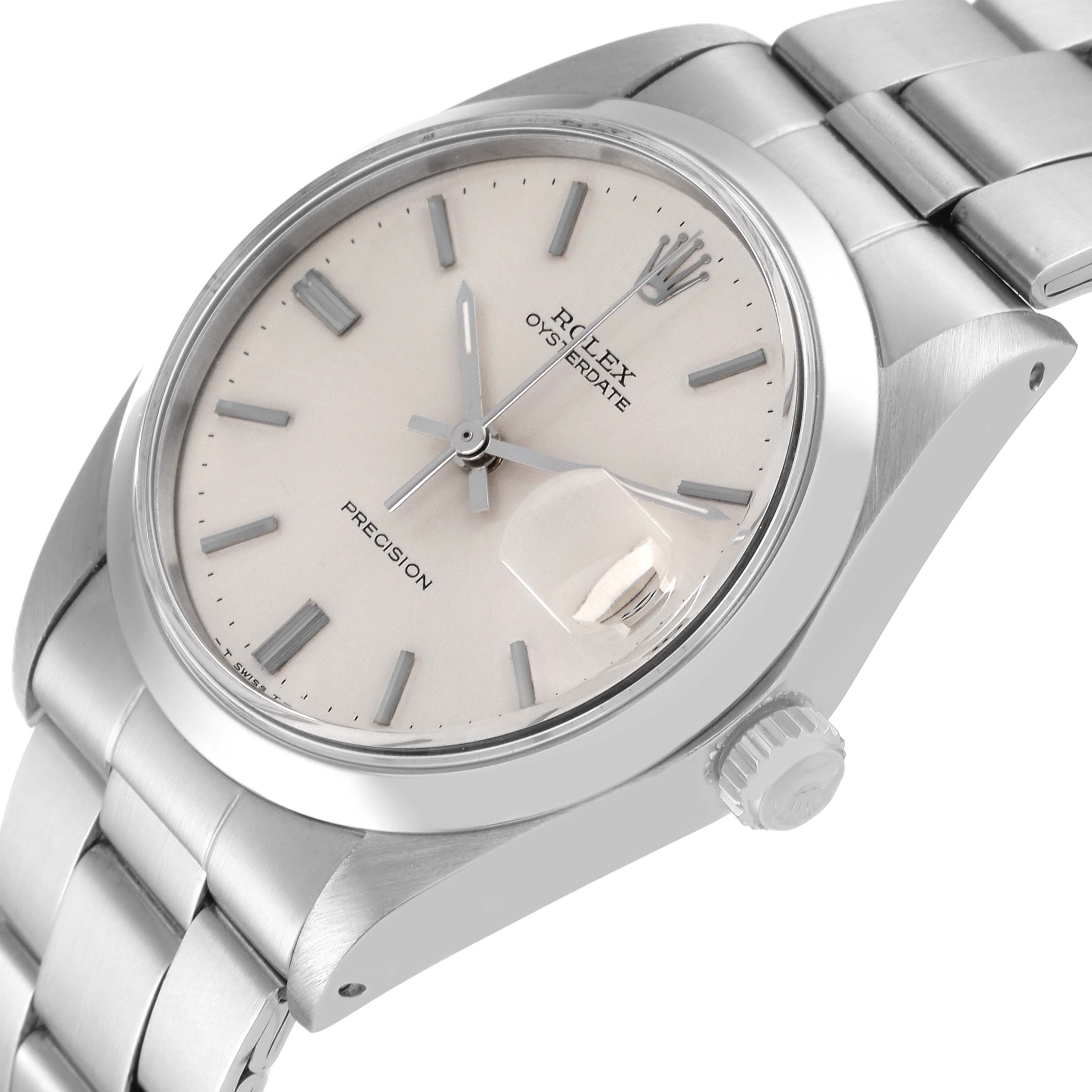 This image shows the face, bezel, crown, and part of the bracelet of the Rolex Vintage Collection 6694 Men's Stainless Steel Silver Dial 6694 Men's Stainless Steel Silver Dial Oysterdate model at a slight angle.