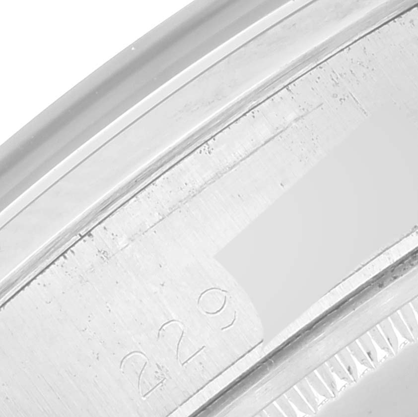 The image shows a close-up of the case back and inner rim of a Rolex Vintage Collection 6694 Men's Stainless Steel Silver Dial 6694 Men's Stainless Steel Silver Dial watch.