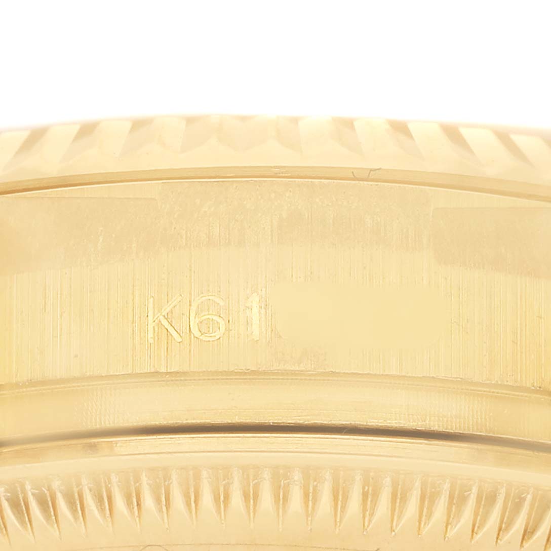 The image shows a close-up of the side of a Rolex President 179178 Men's Yellow Gold Mother of Pearl Dial watch, highlighting the case and bezel with a "K61" engraving.