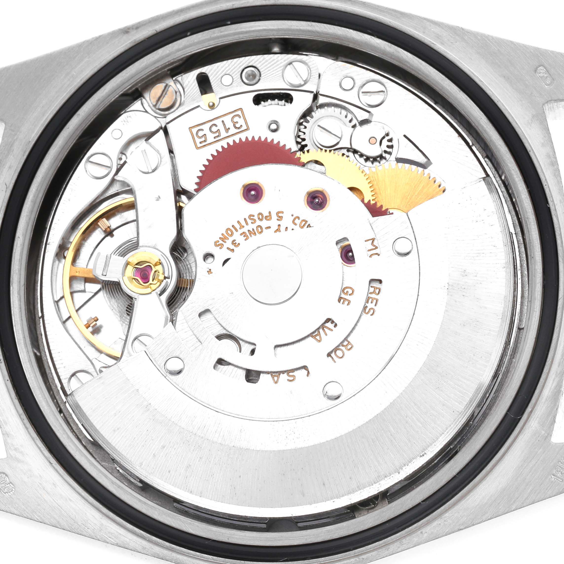 The image shows the internal mechanism of a Rolex President 18349 Men
s White Gold Silver Dial 18349 Men
s White Gold Silver Dial model watch from a back view, highlighting gears and components.